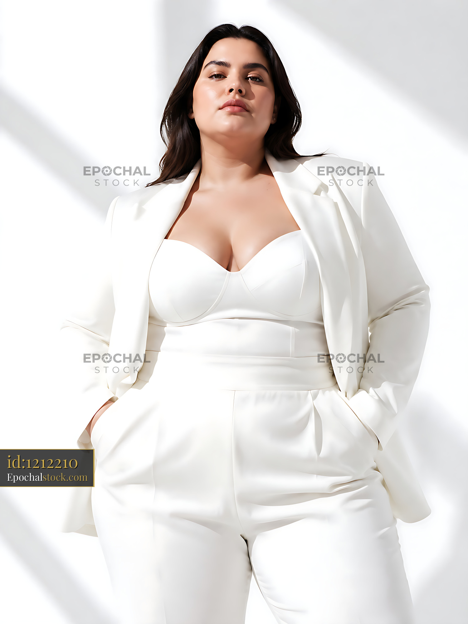 Woman in White Suit Stands Confidently With Hands in Pockets — stock example for Seedream 4.5 solution examples