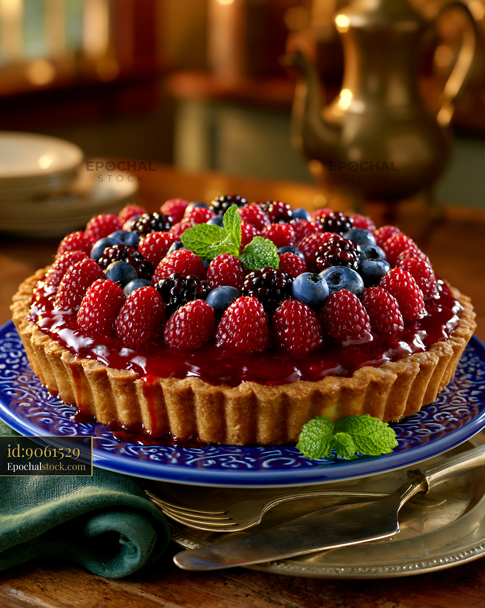 Watermarked full-resolution preview of Berry tart placed on a blue plate in a cozy kitchen setting