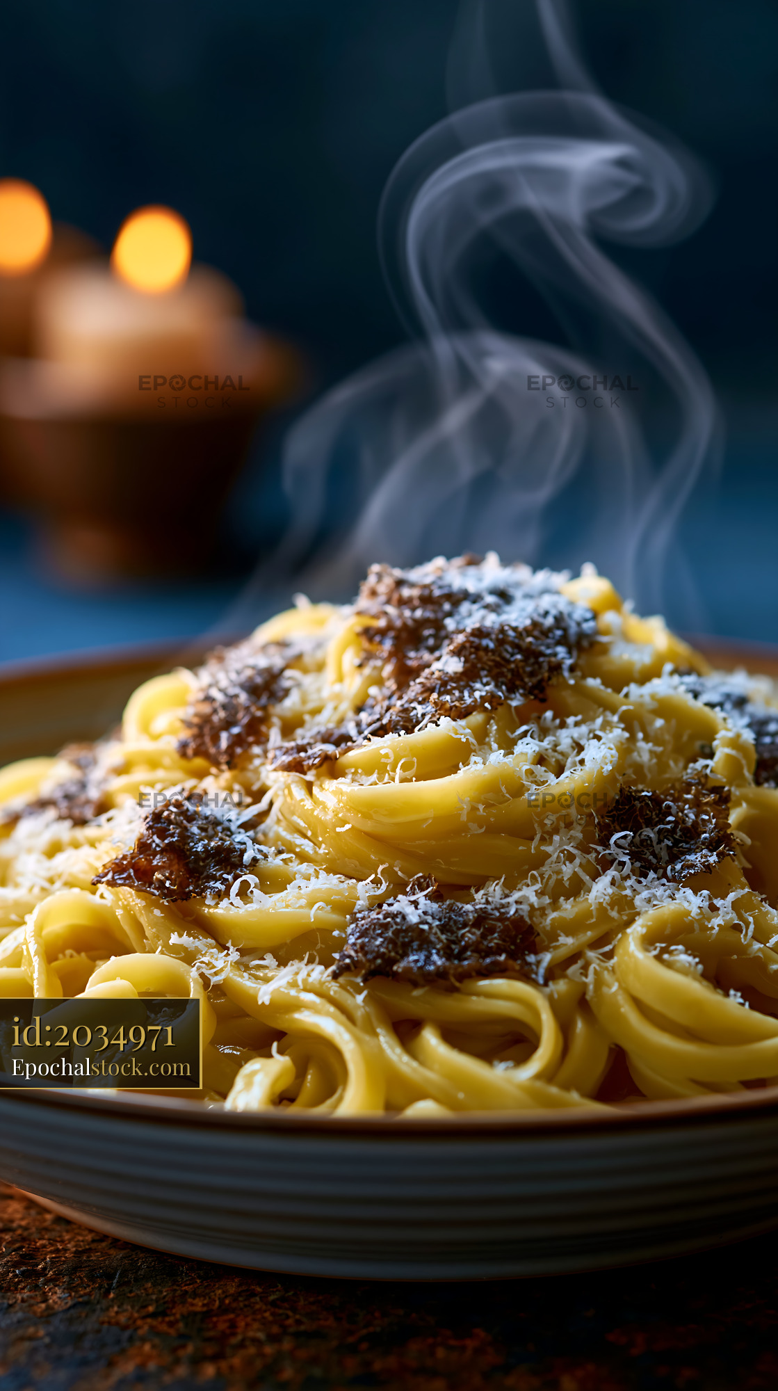 Watermarked full-resolution preview of Pasta served with meat sauce and grated cheese on a plate