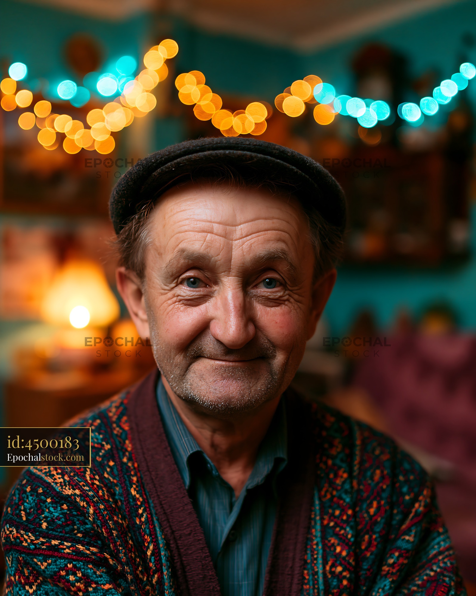 Older Man Smiling Warmly in Decorated Home During Evening - stock photo