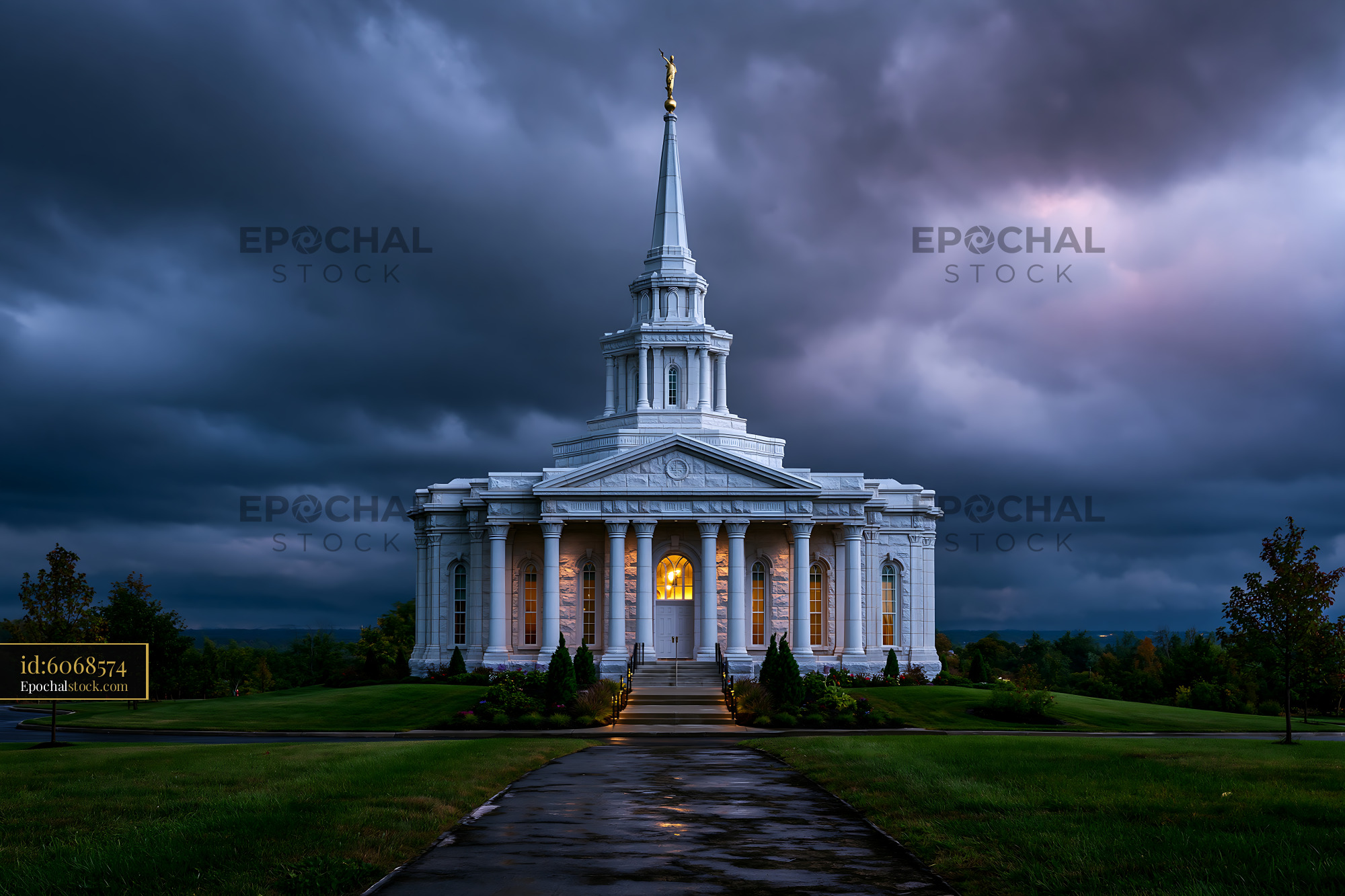 Watermarked full-resolution preview of Building with a tall spire under a cloudy sky in the evening