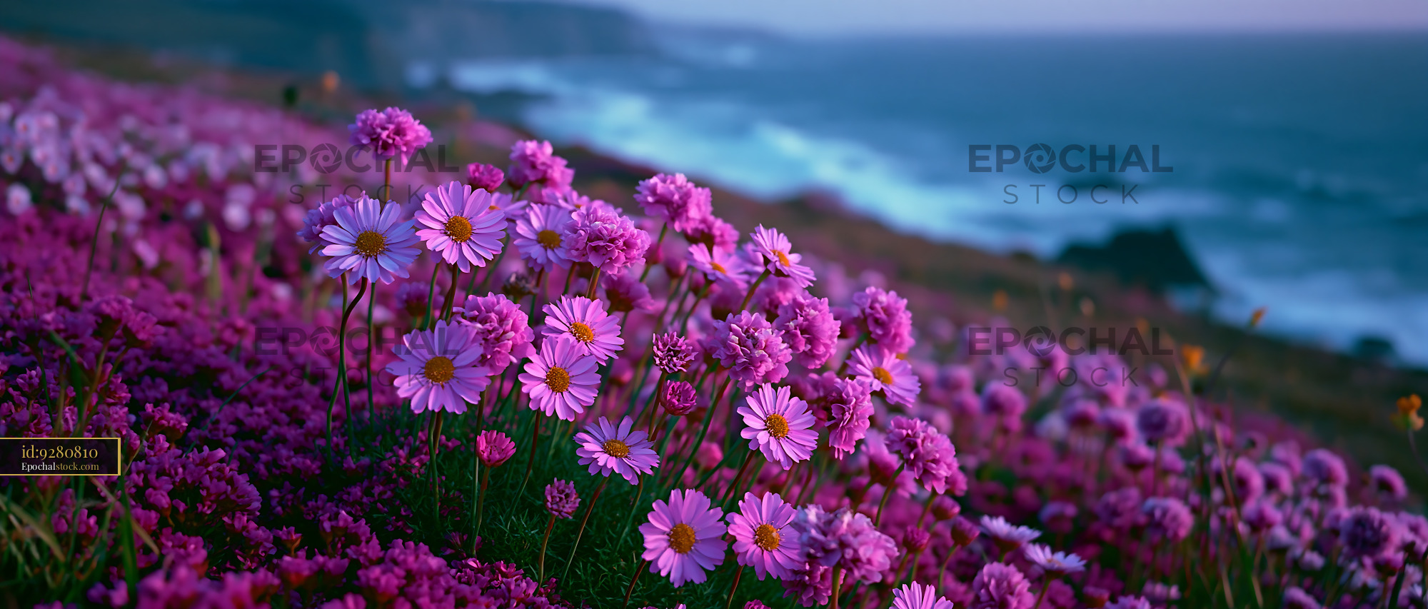Watermarked full-resolution preview of Vibrant flowers bloom near ocean waves at sunset
