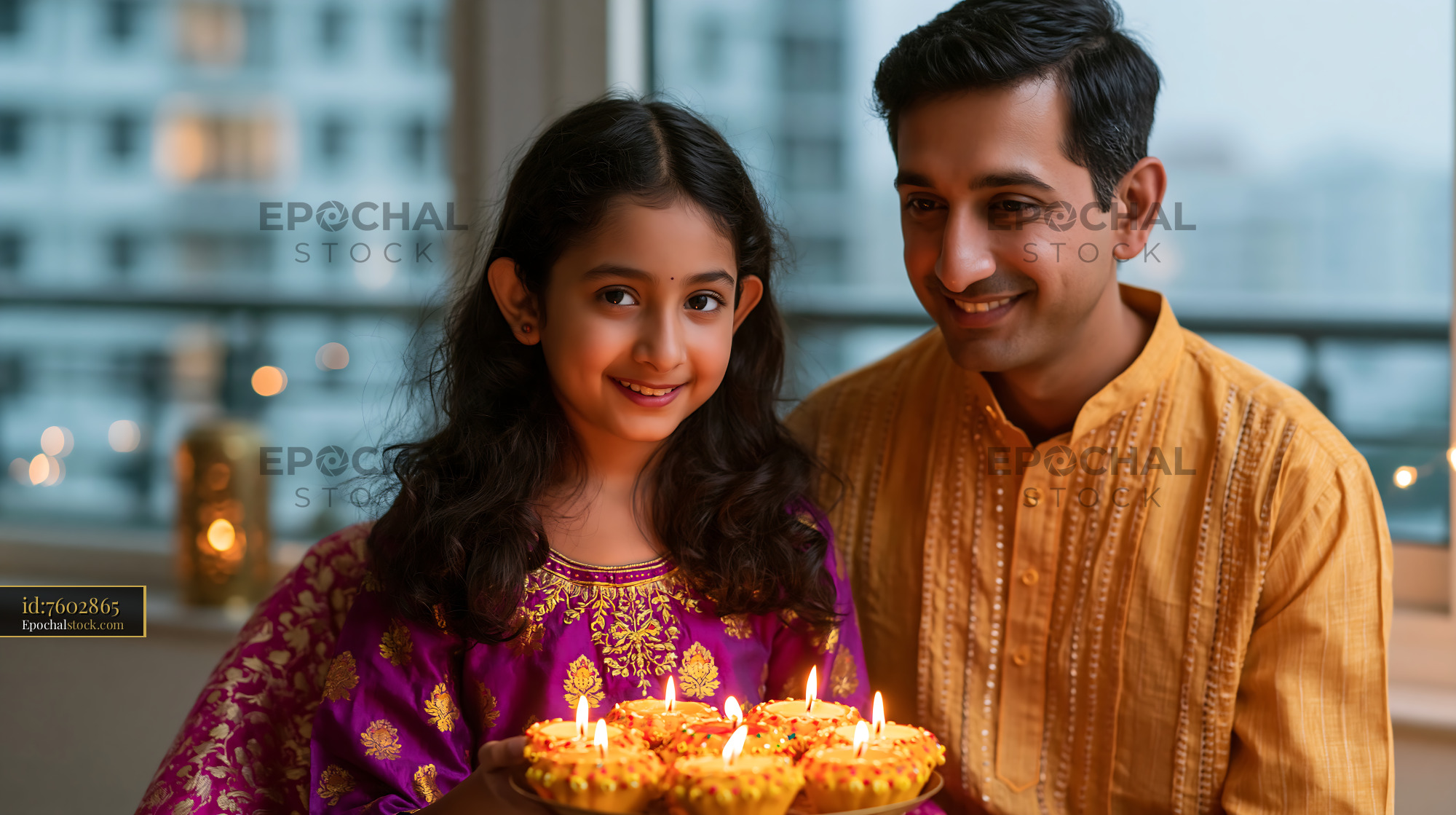 Watermarked full-resolution preview of Father and daughter celebrate festival with traditional sweets
