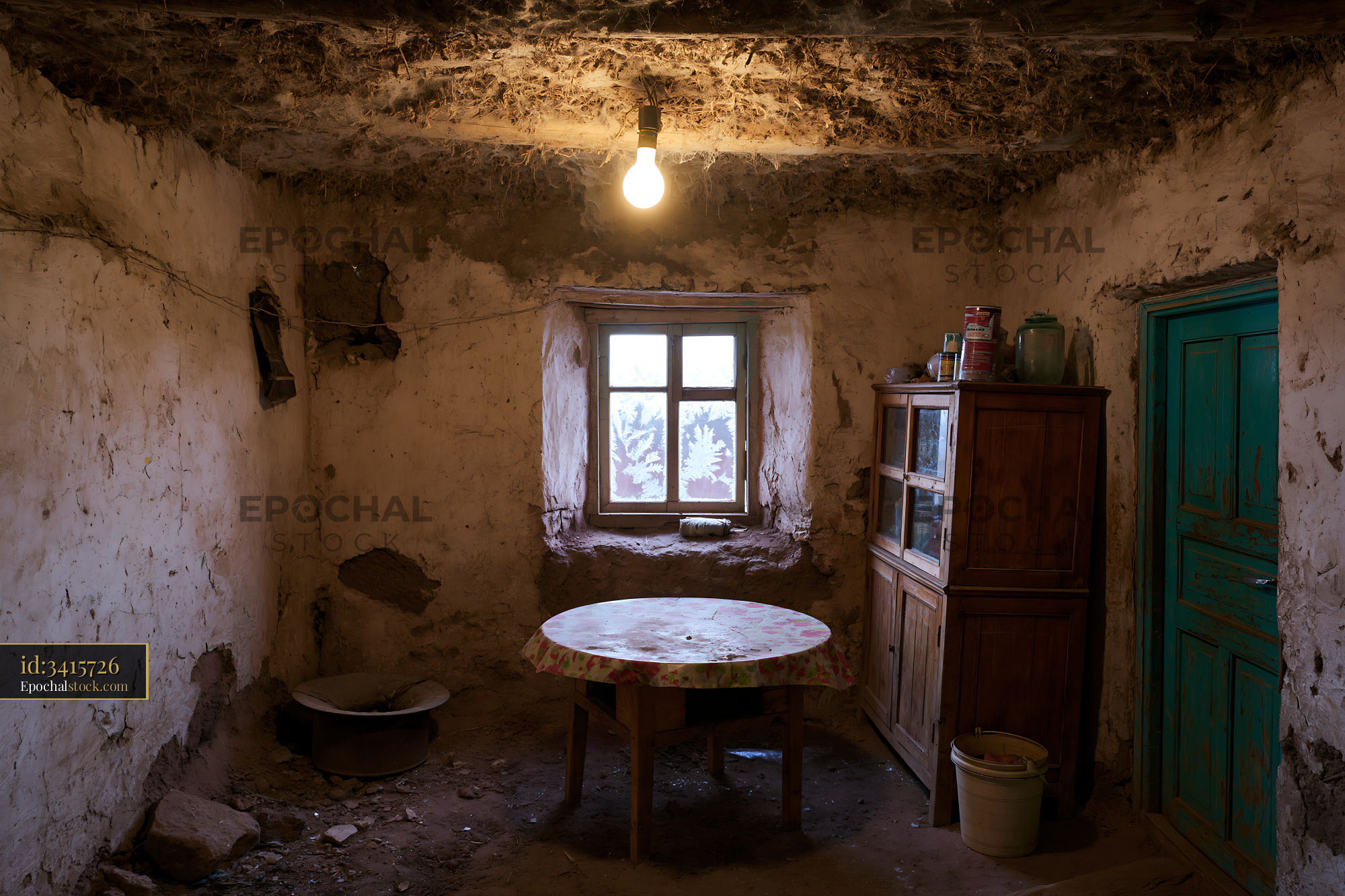 Watermarked full-resolution preview of Old rustic room with wooden table and window