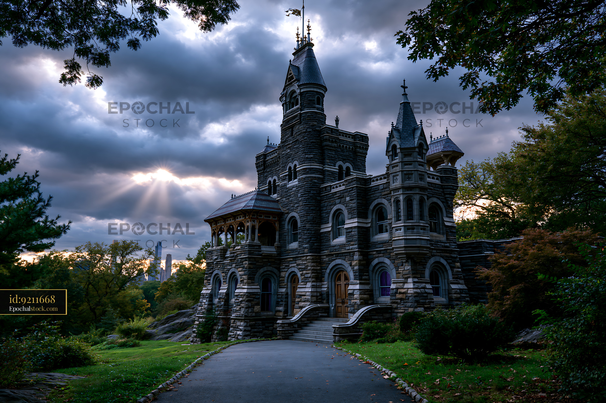 Watermarked full-resolution preview of Historic castle stands in a park under dramatic clouds in the evening