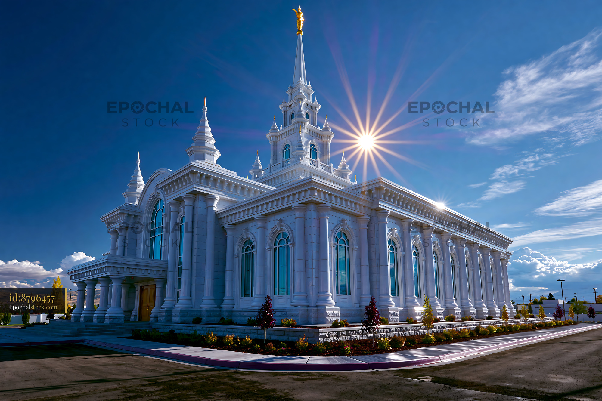 Watermarked full-resolution preview of Church building with a tall spire under a clear blue sky