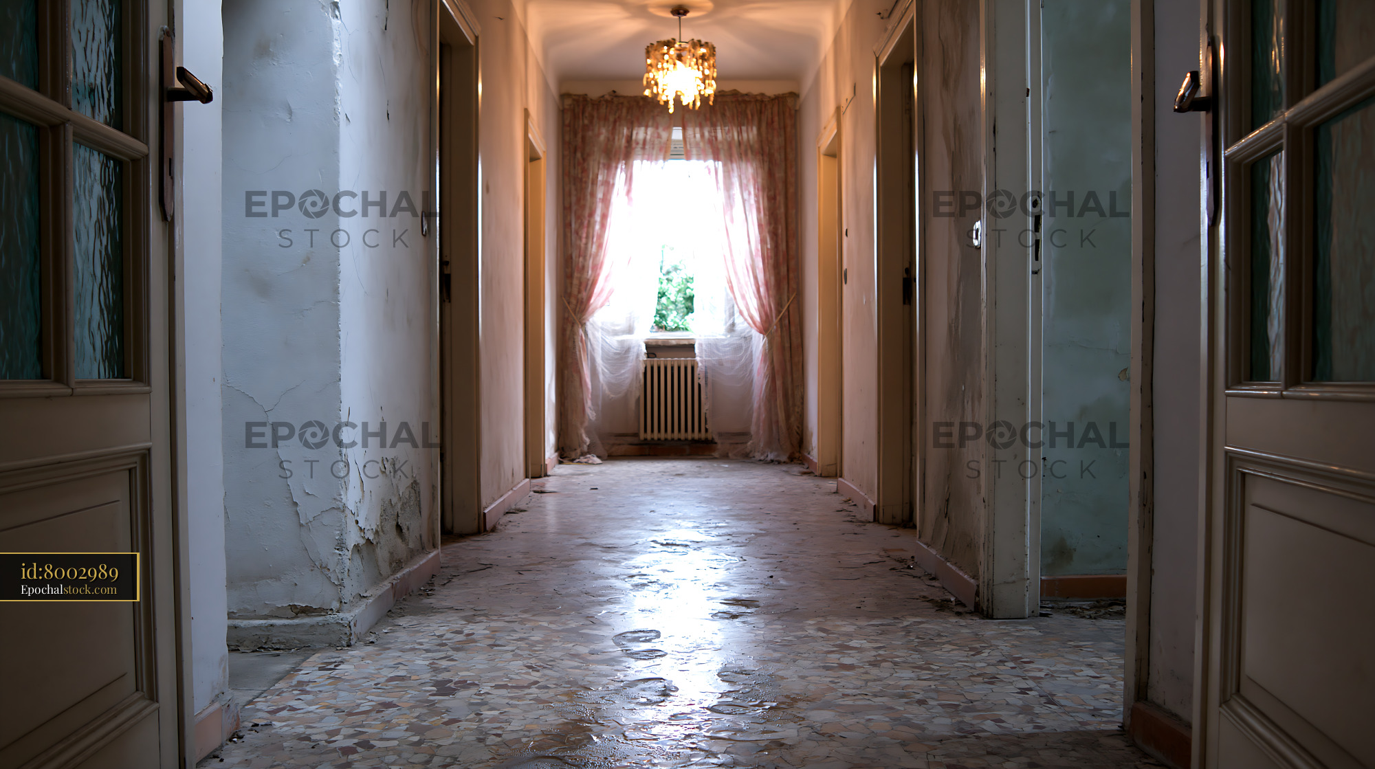 Crumbling Corridor of a Communal Flat With Distressed Walls - stock photo