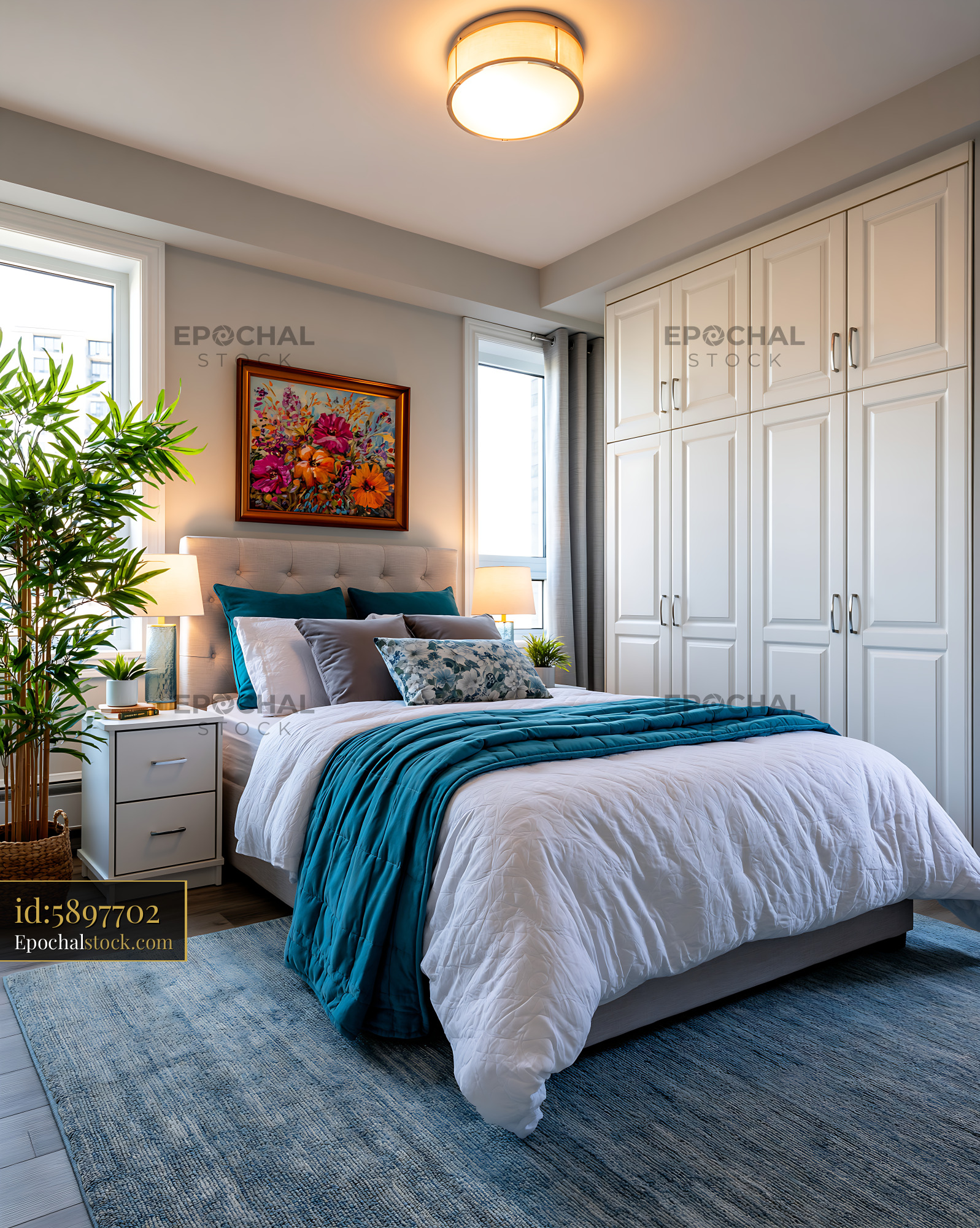 Watermarked full-resolution preview of Cozy bedroom with white bed and blue accents in modern design