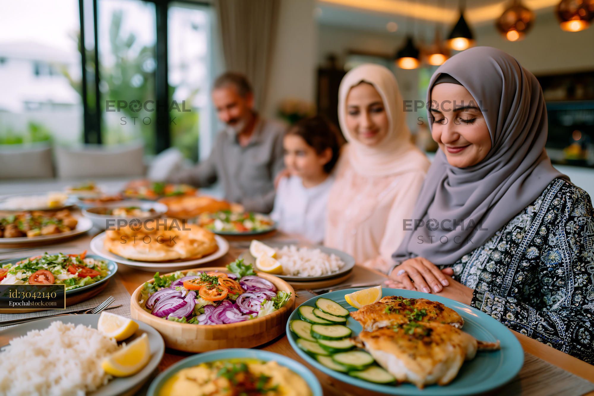 Watermarked full-resolution preview of Family gathering with traditional food in a cozy dining space