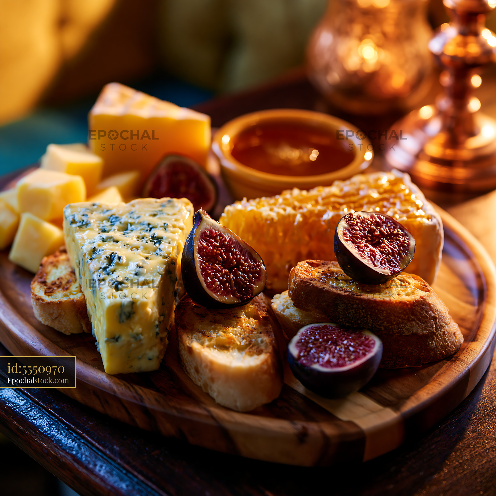 Watermarked full-resolution preview of Cheese and bread platter with figs and honey served on a wooden board