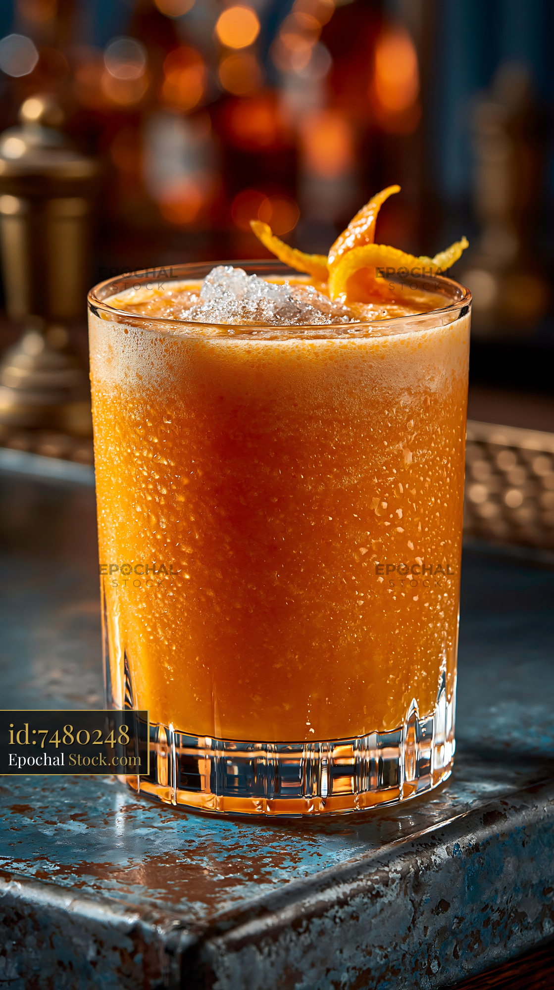 Hallabong citrus smoothie with crushed ice and orange zest garnish - stock photo