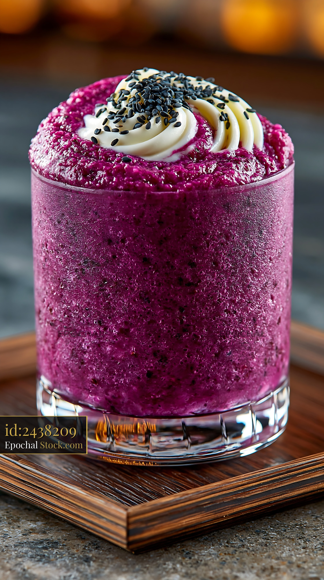 Purple sweet potato smoothie with cream and black sesame seeds - stock photo