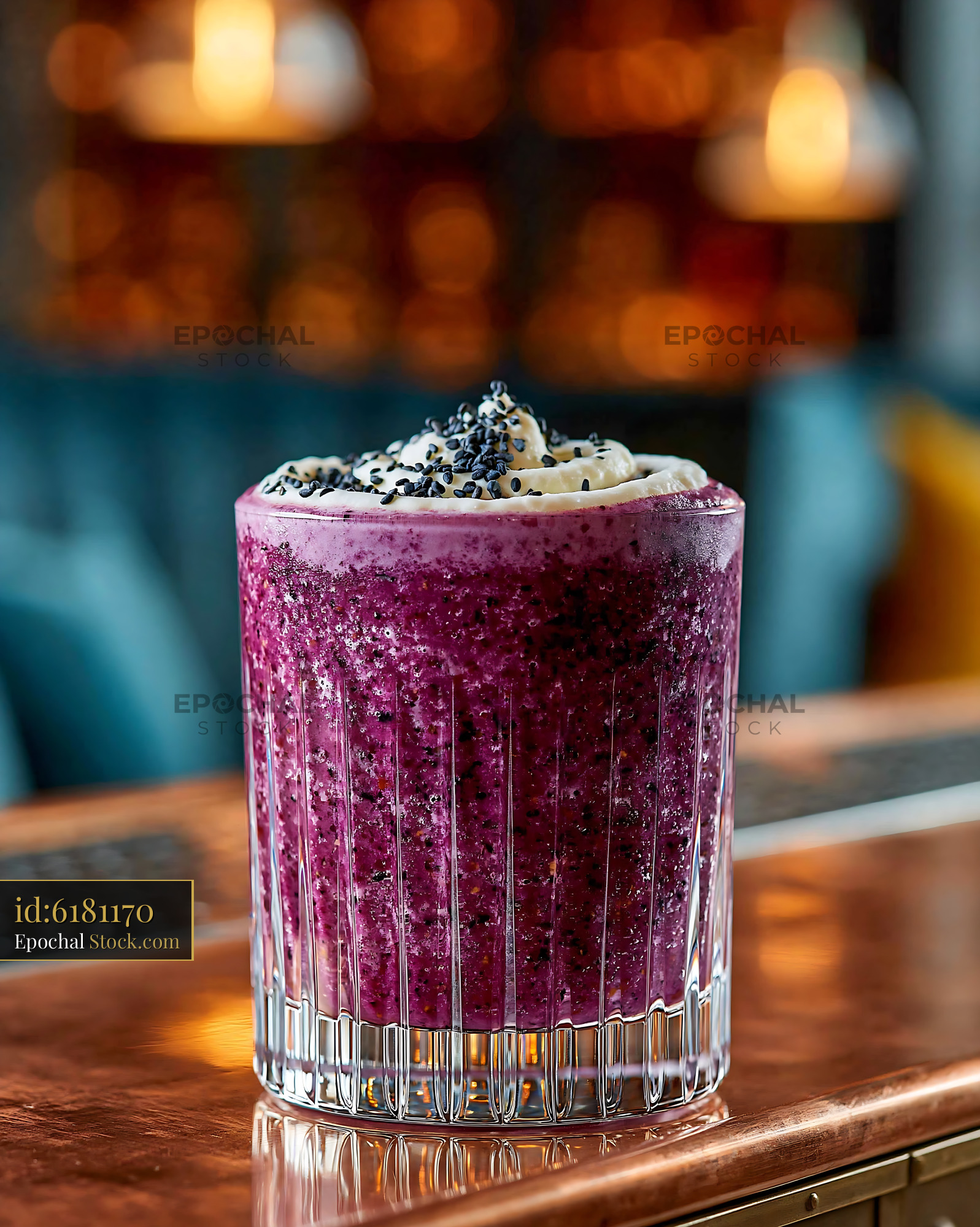 Vibrant purple sweet potato smoothie with cream on a copper bar - stock photo