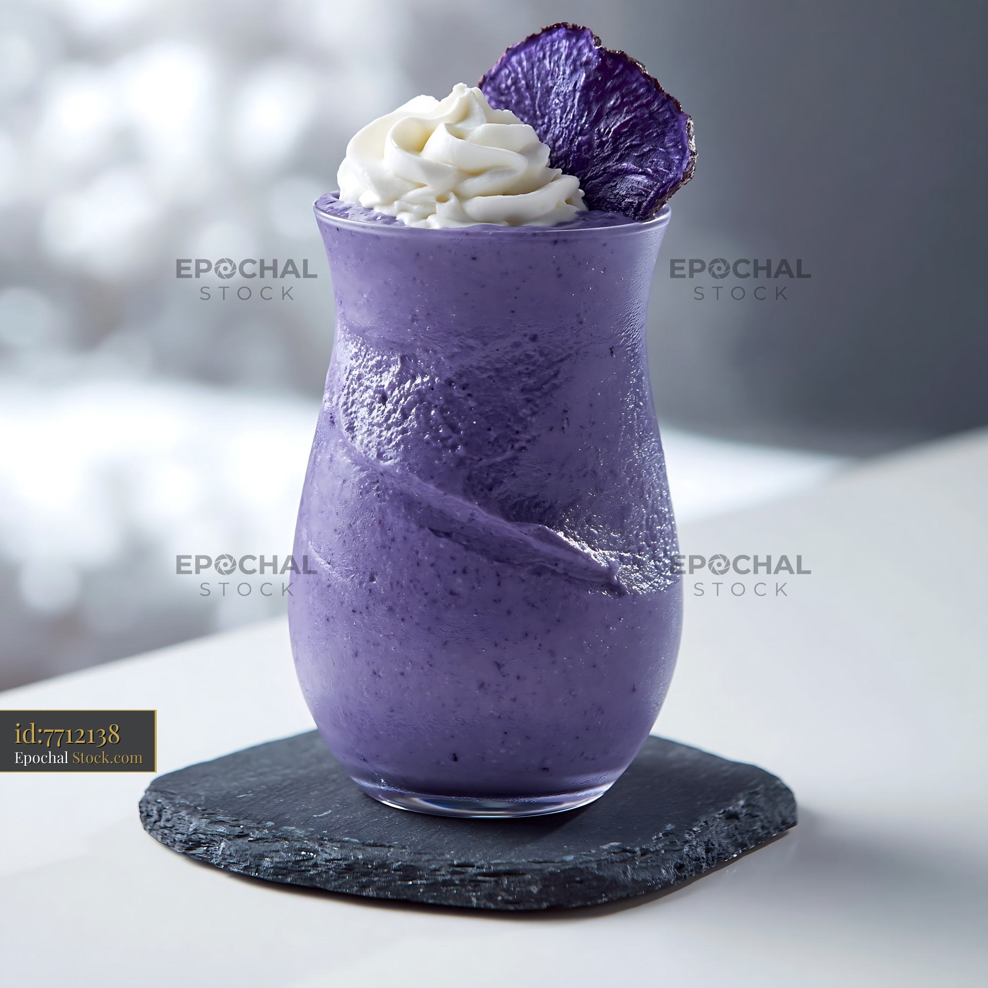 Beni imo smoothie topped with whipped cream and sweet potato chip - stock photo