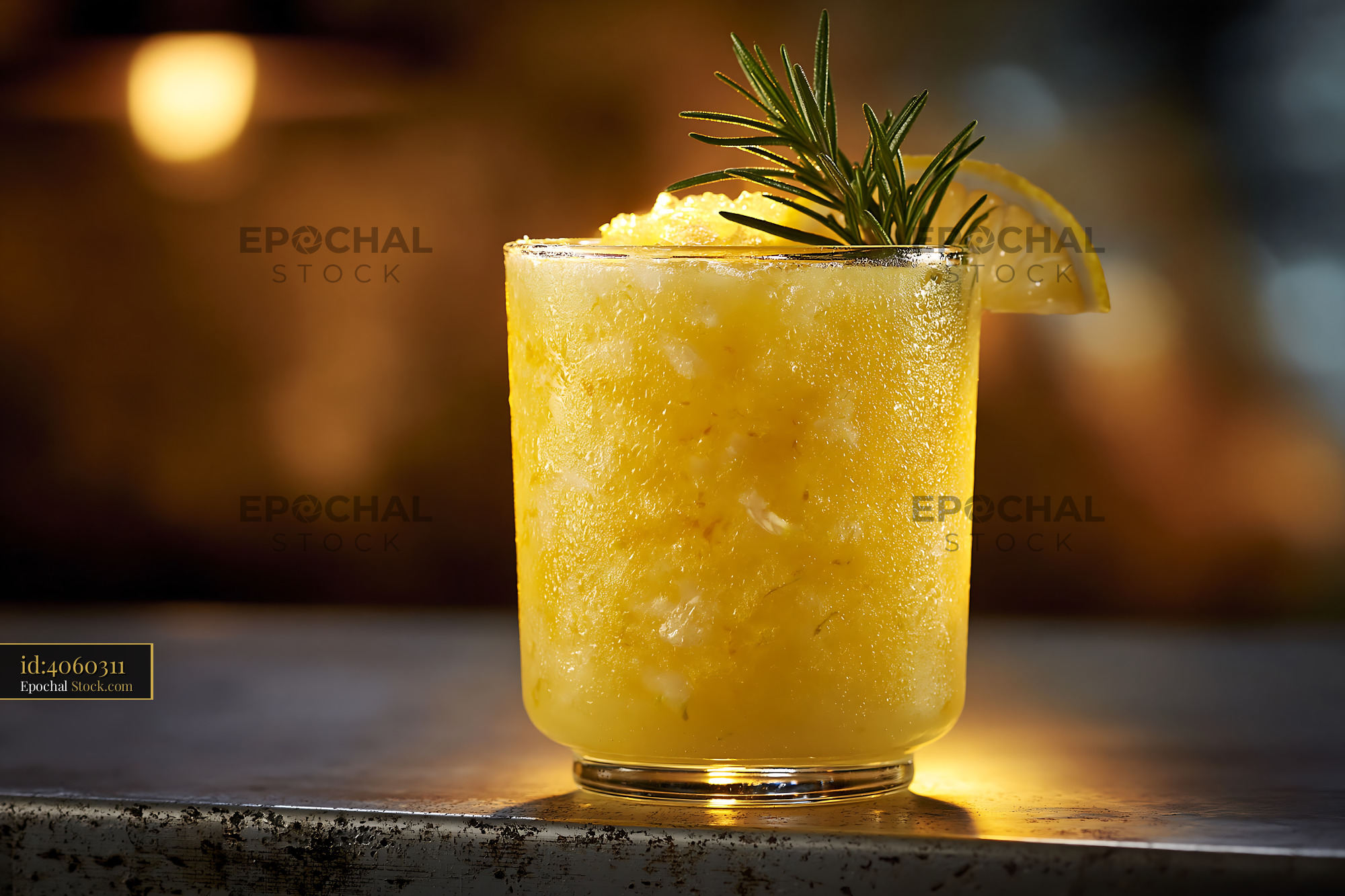 Refreshing yuja citron smoothie with rosemary garnish on a bar counter - stock photo