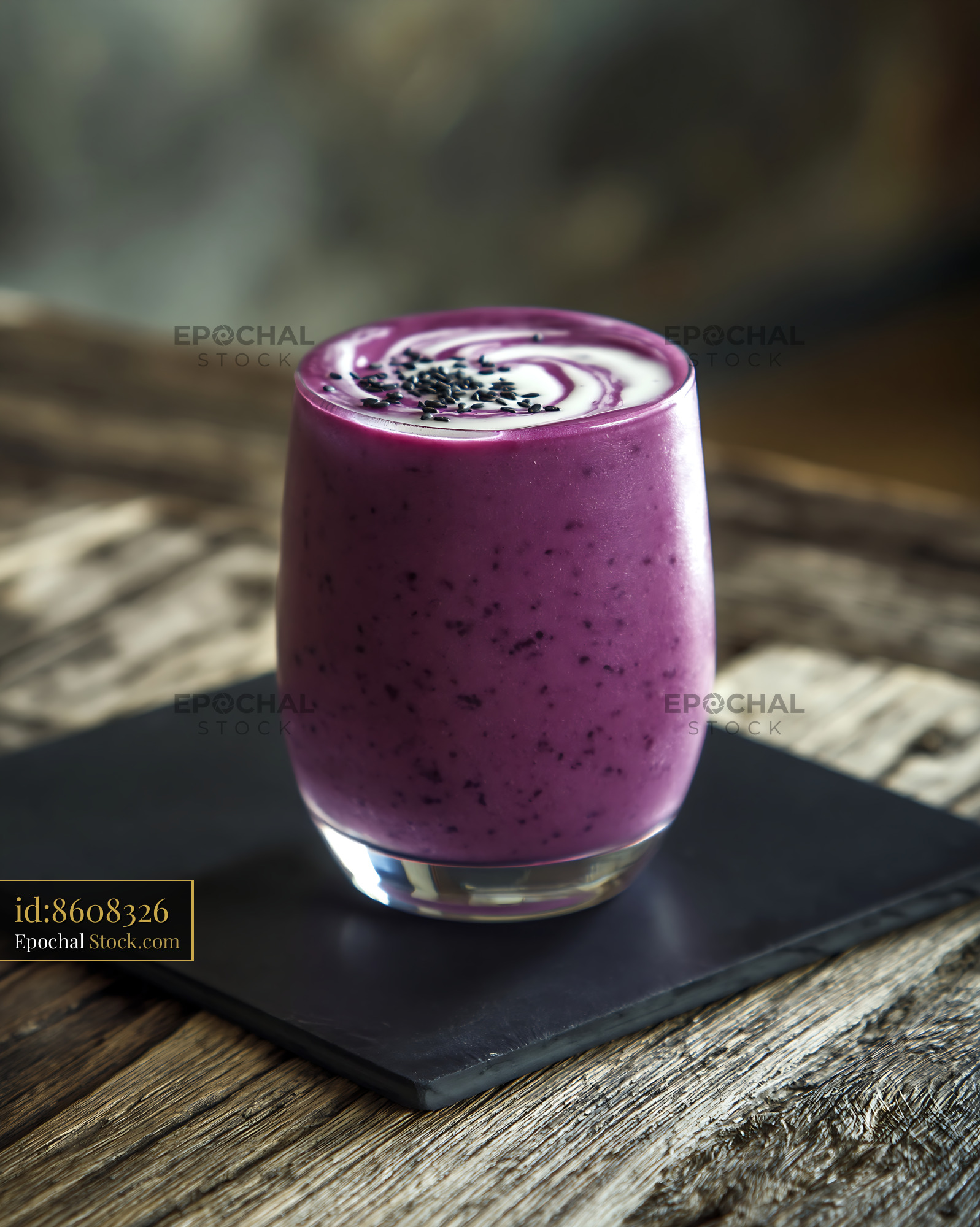 Purple sweet potato smoothie with yogurt swirl and sesame seeds - stock photo