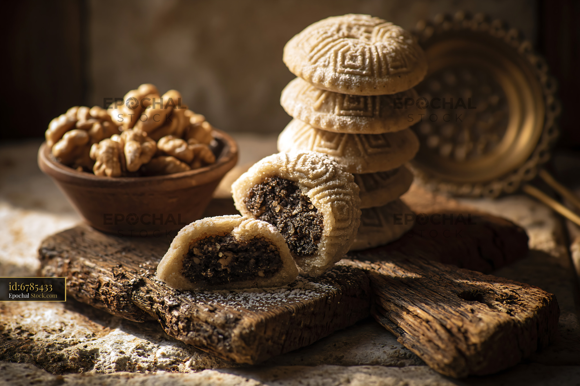 Traditional walnut maamoul biscuits on a rustic wooden board - stock photo