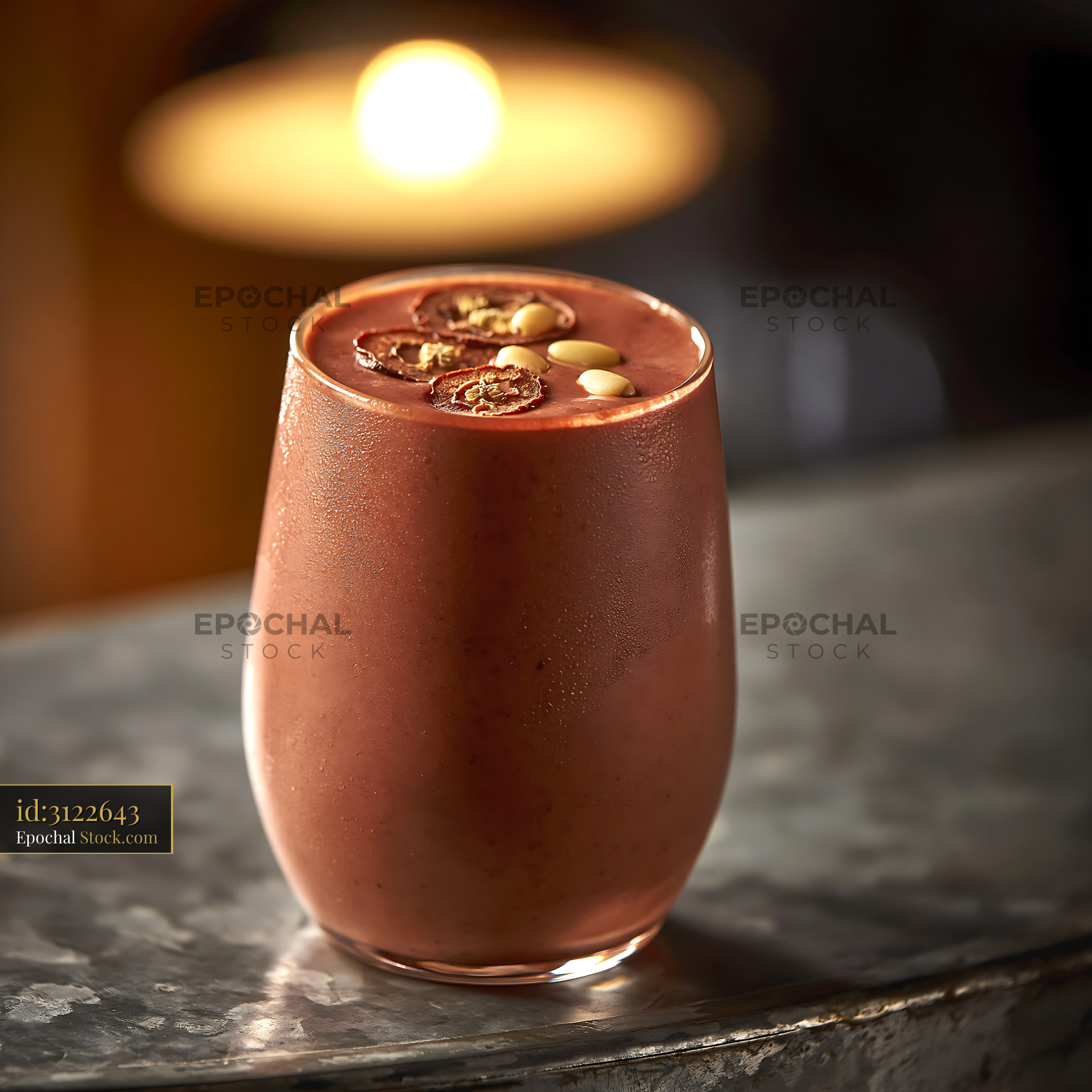 Daechu jujube smoothie topped with dried fruit and pine nuts - stock photo