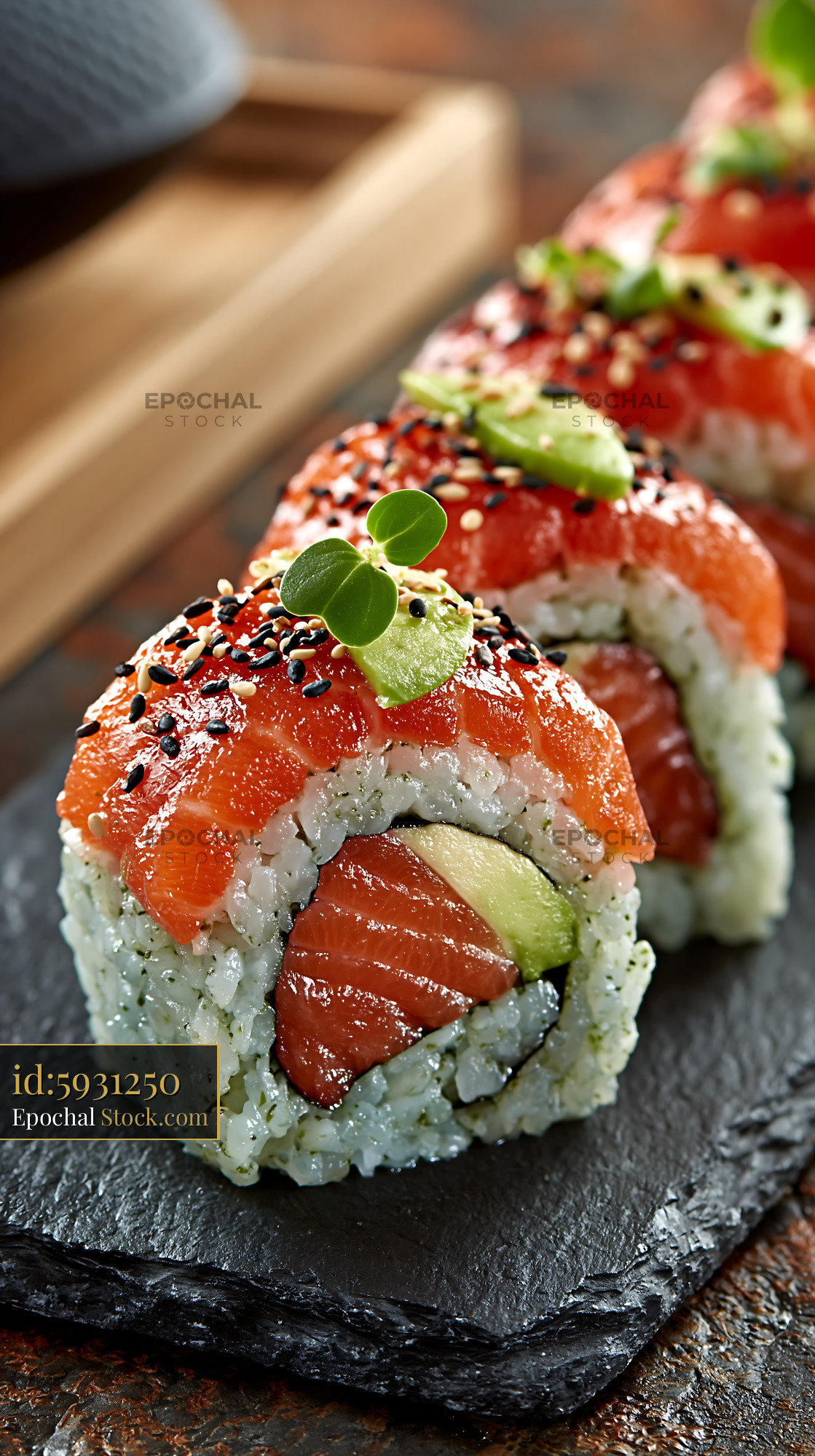 Matcha infused rice sushi rolls with fresh salmon and avocado - stock photo