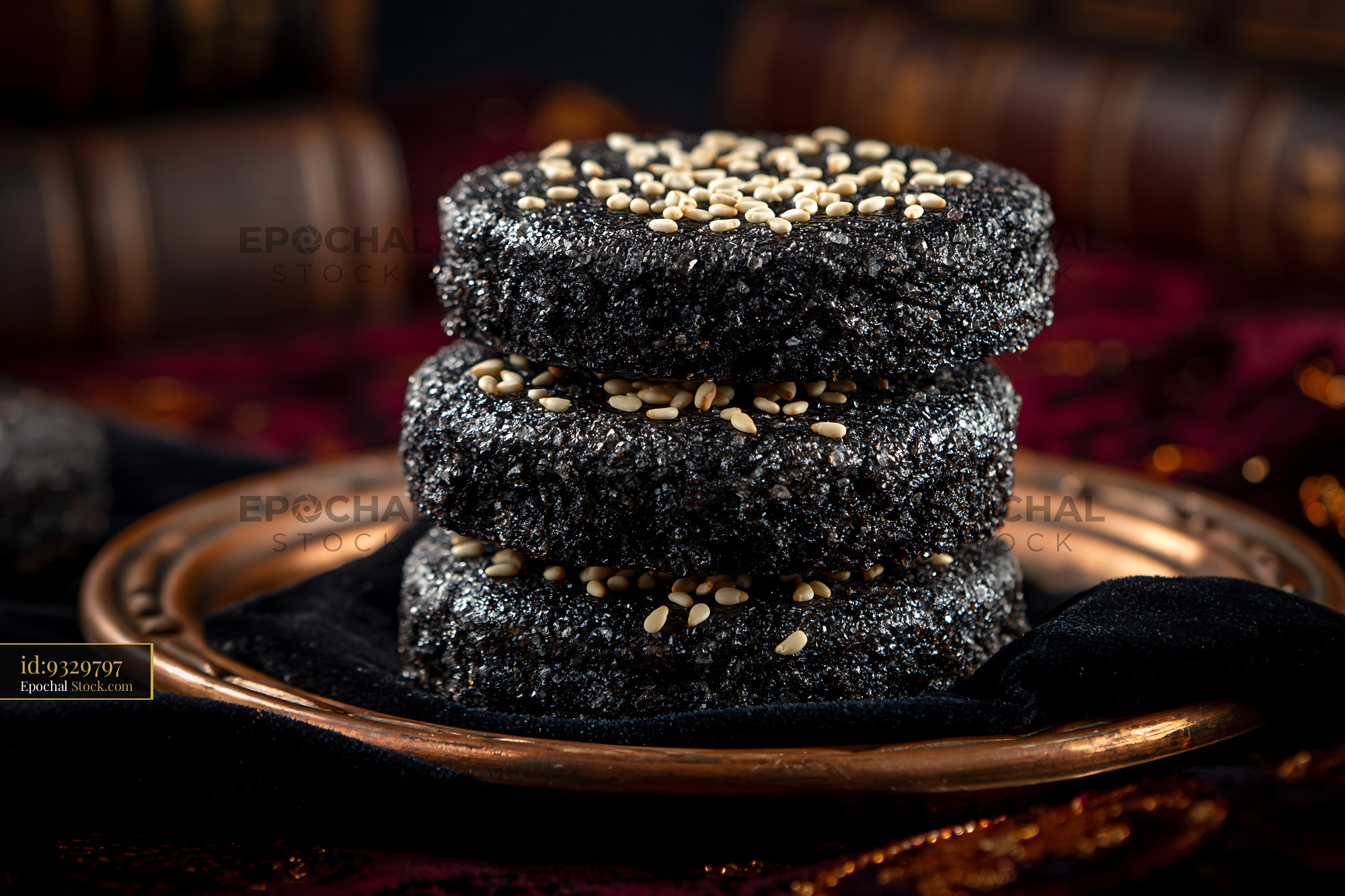 Stack of traditional dibs el kharroub biscuits with sesame seeds - stock photo