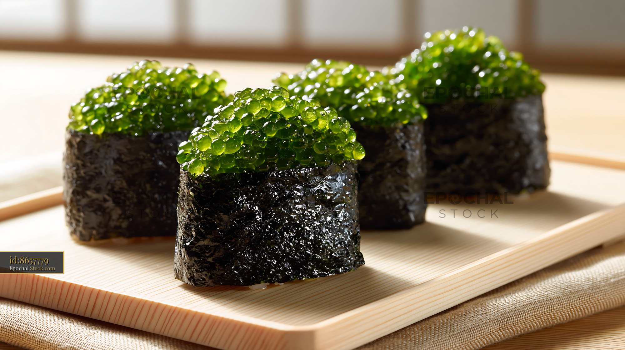 Fresh umi budo sushi gunkan maki on a traditional wooden board - stock photo