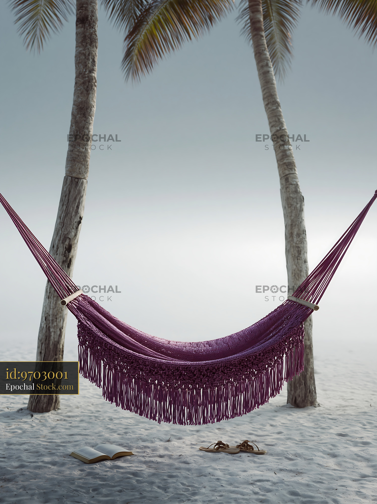 Purple hammock between palm trees on a serene white sand beach - stock photo