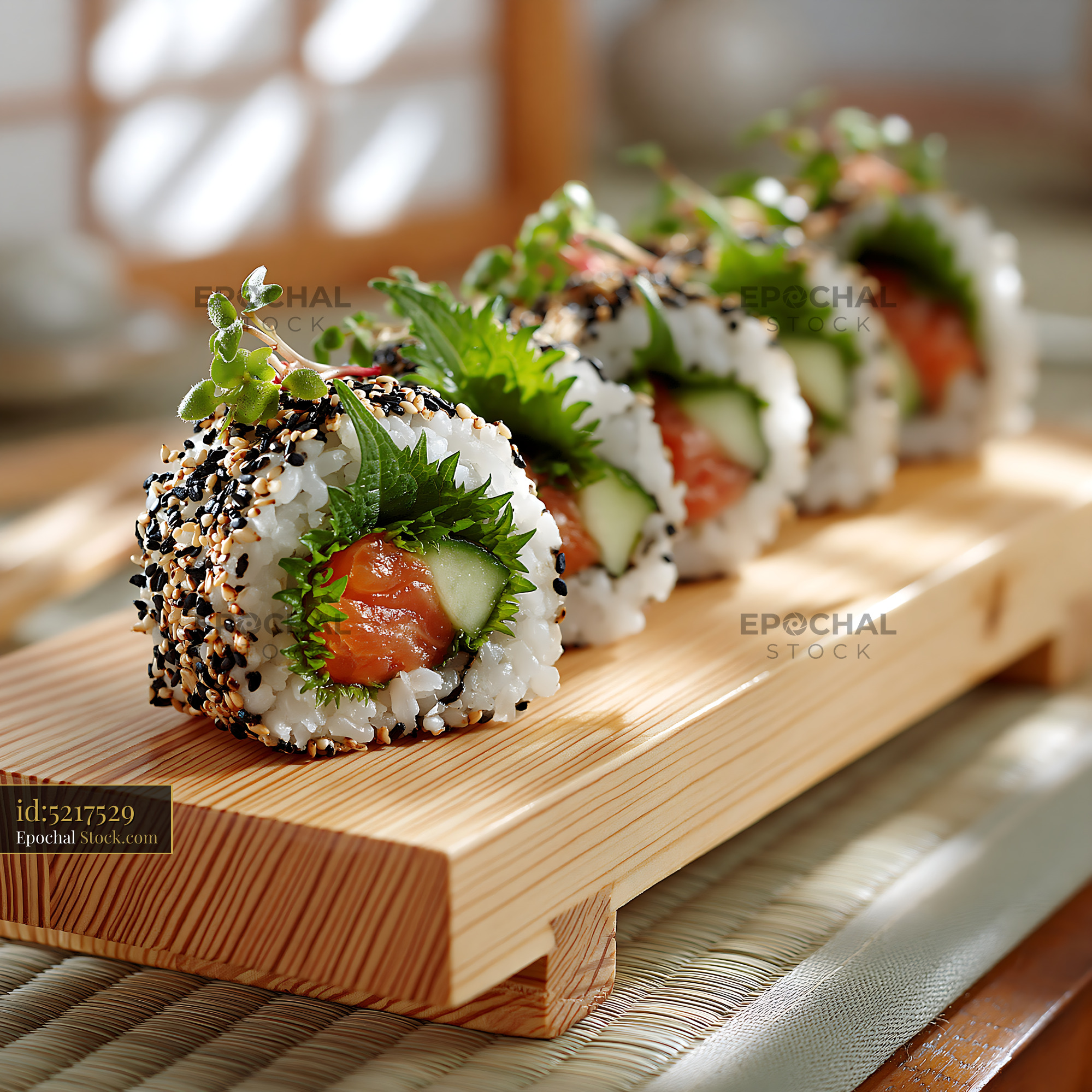 Fresh shiso leaf uramaki sushi with salmon and sesame seeds - stock photo