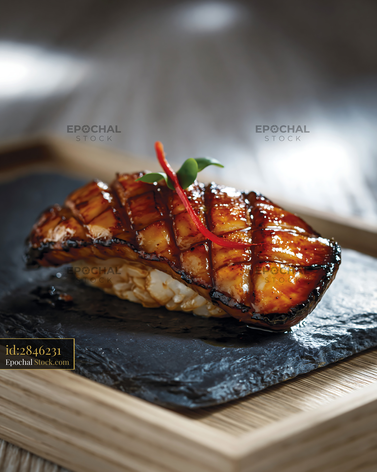 Grilled king oyster mushroom sushi with glaze on black slate plate - stock photo