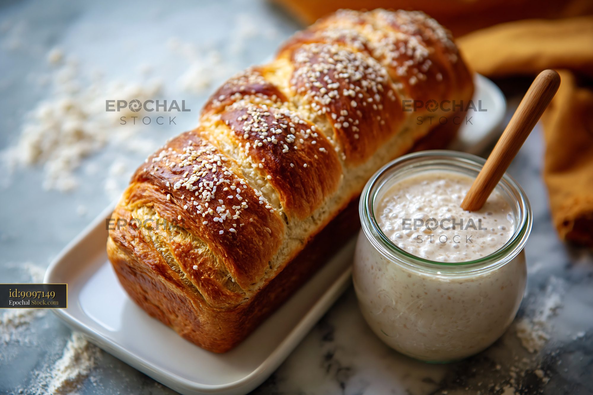 Amish friendship german bread with bubbling starter culture in a jar - stock photo