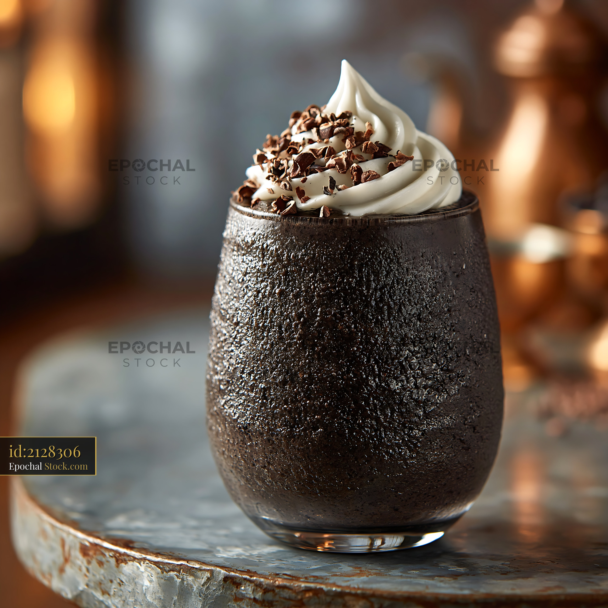 Dark black bean smoothie with whipped cream and cocoa nibs - stock photo