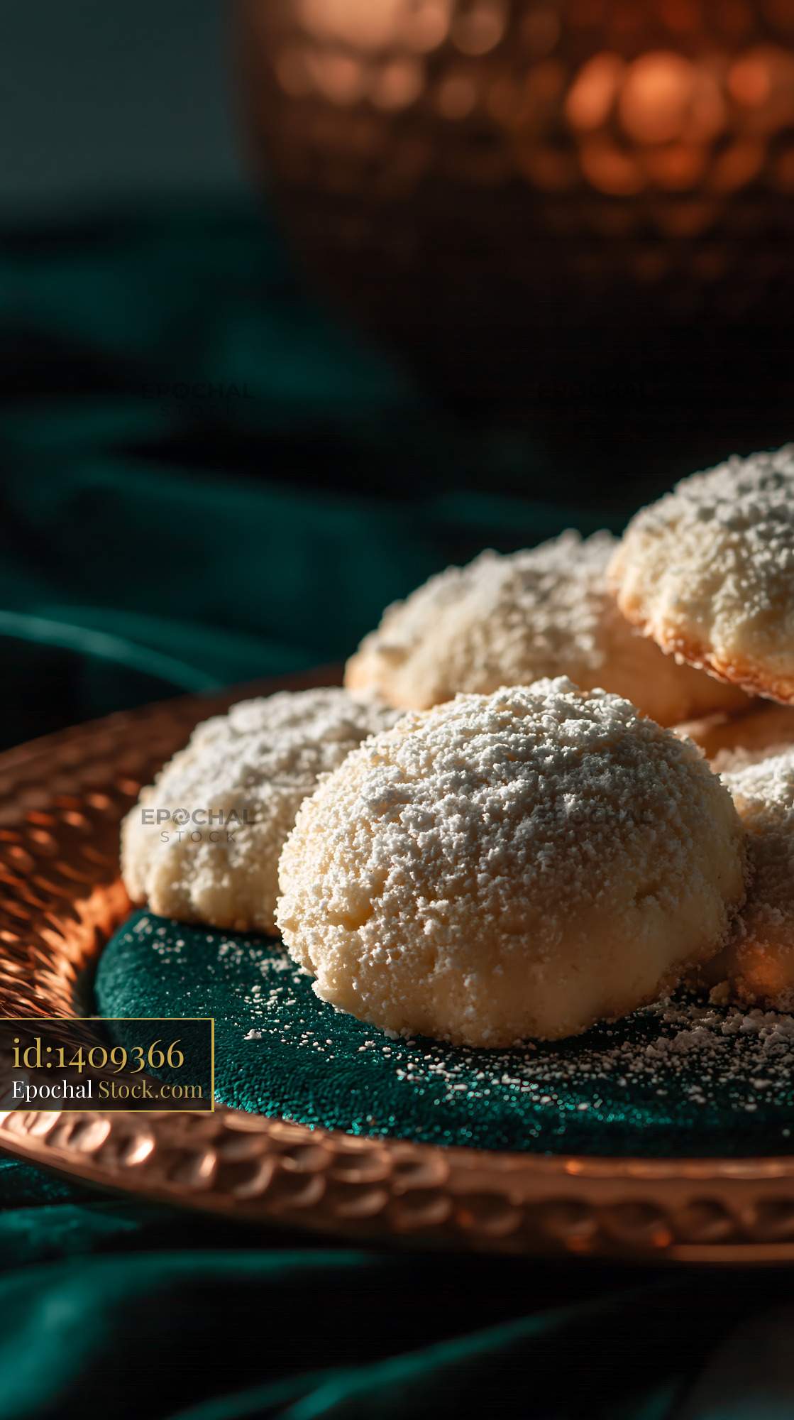 Un kurabiyesi biscuits dusted with sugar on a copper plate - stock photo