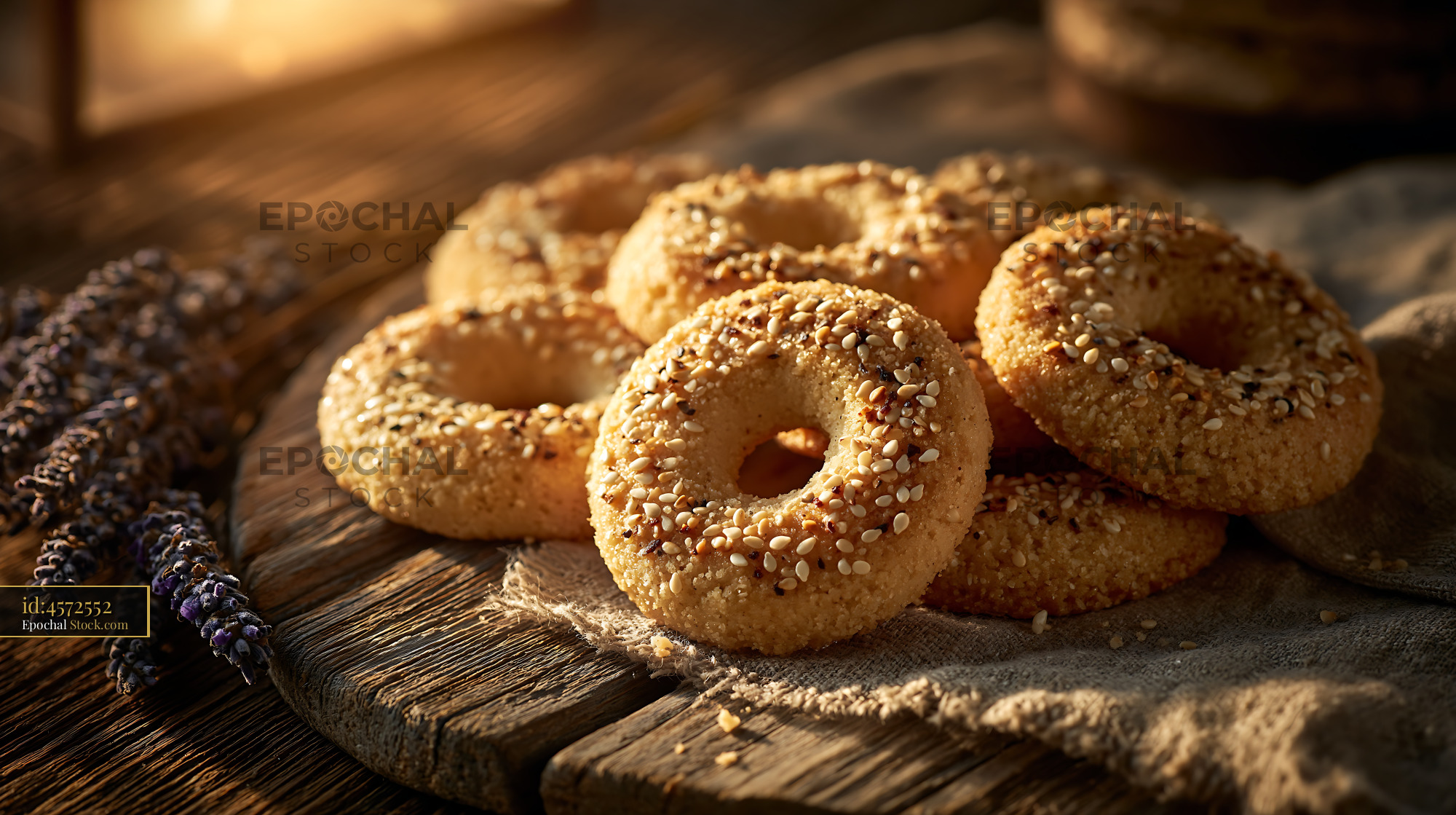 Traditional mahlab spice biscuits with sesame seeds on rustic wood - stock photo