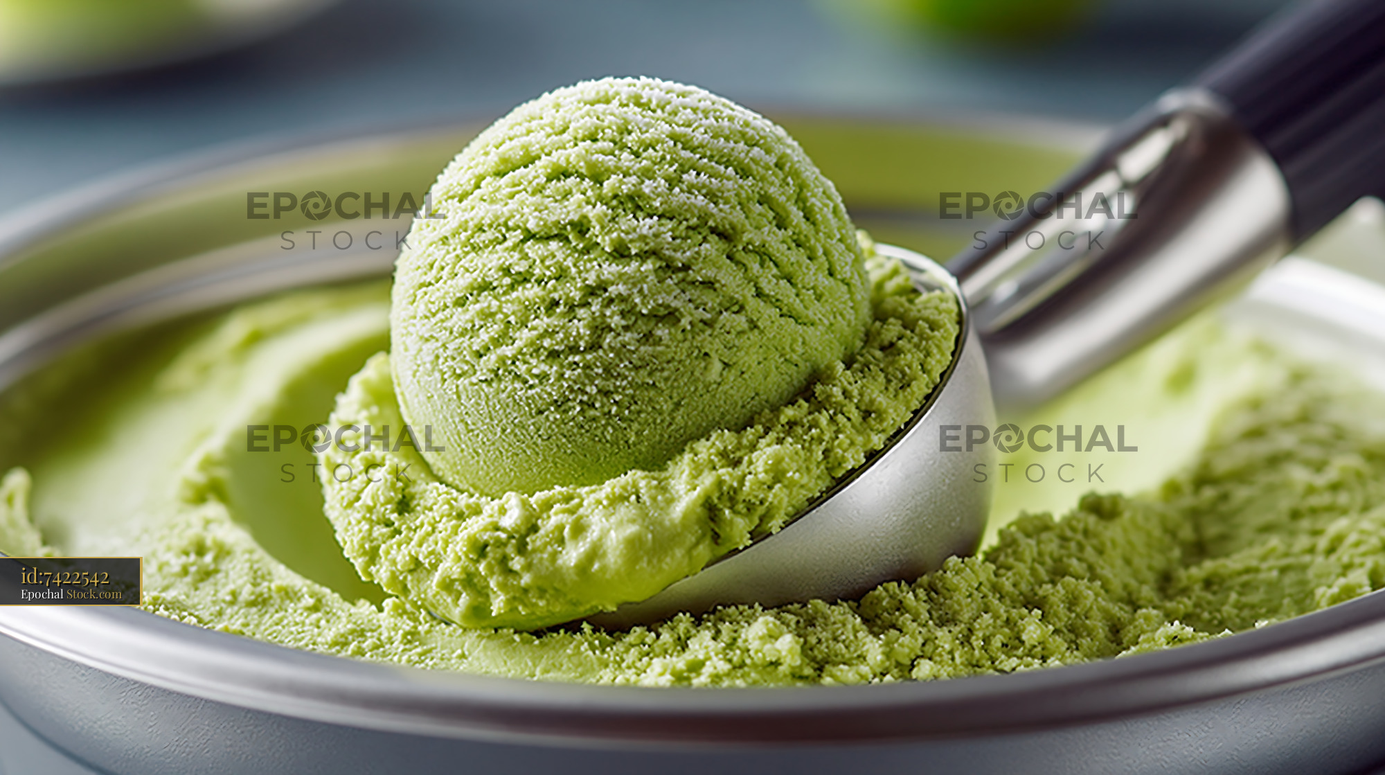 Fresh scoop of chartreuse ice cream in a metal server - stock photo
