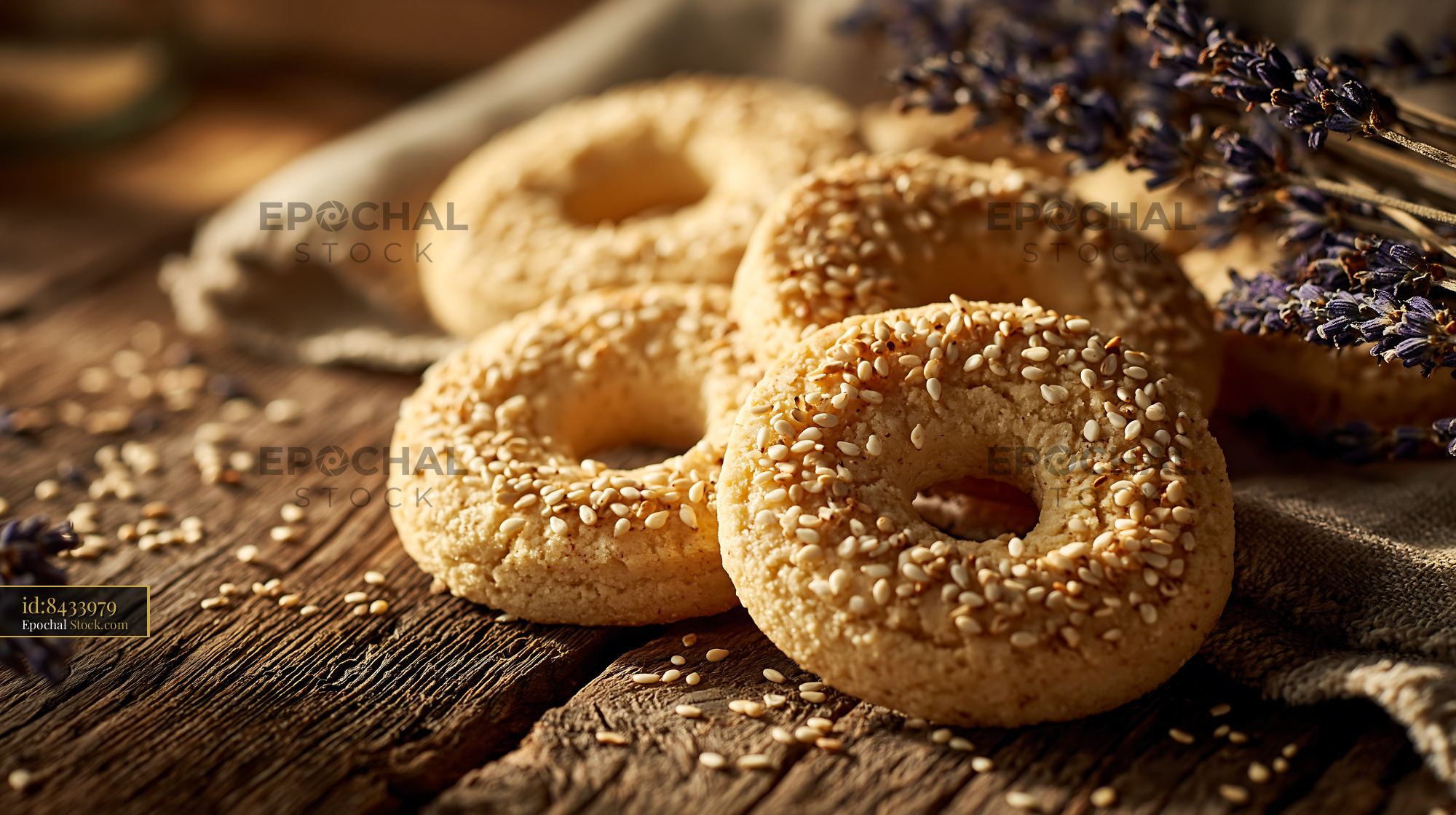 Mahlab spice biscuits with sesame seeds on a rustic wooden table - stock photo
