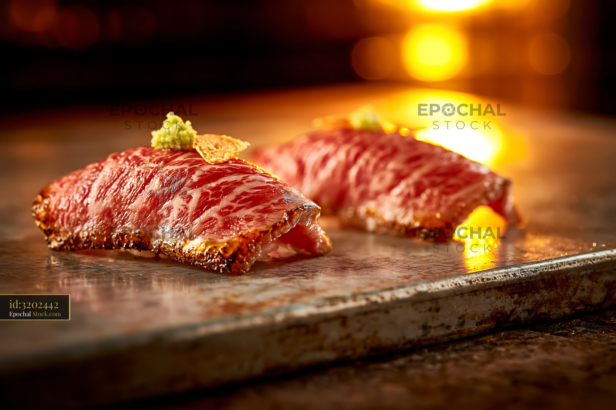Aburi wagyu sushi with seared marbled beef and wasabi garnish - stock photo