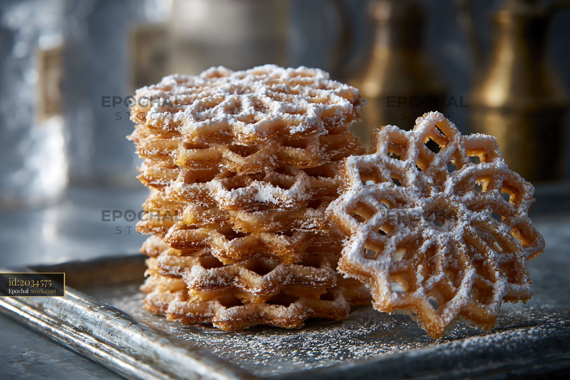 Stack of traditional nan-e panjereh biscuits with powdered sugar - stock photo