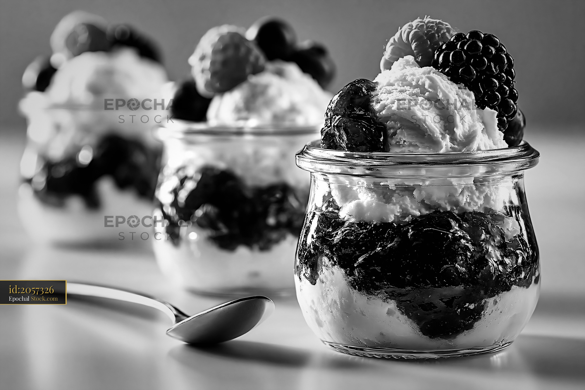 Prosecco ice cream with fresh berries in elegant glass jars - stock photo