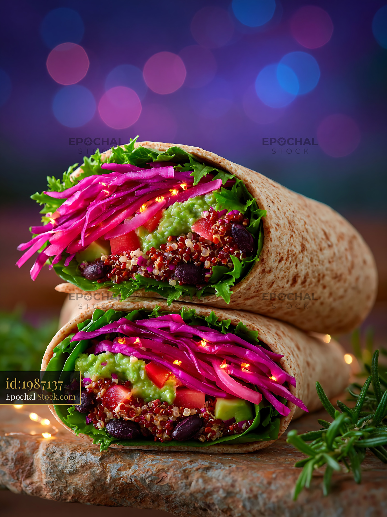 Healthy vegetable wrap with quinoa and avocado on a park bench - stock photo