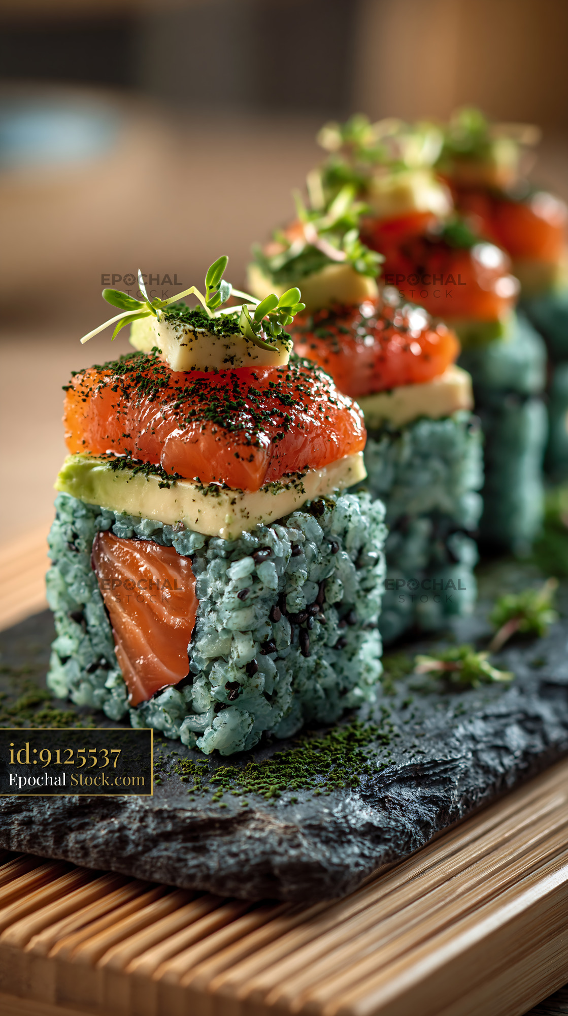 Gourmet salmon and avocado sushi with blue spirulina rice - stock photo