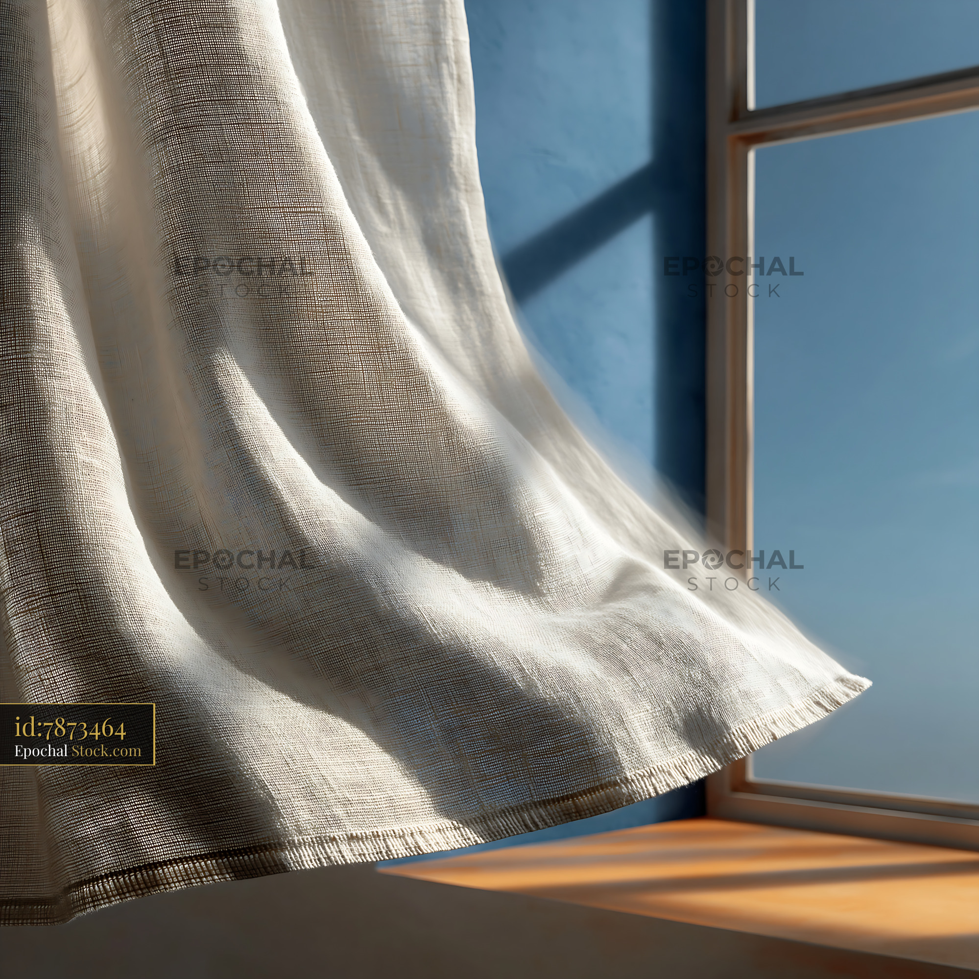 White linen curtains blowing in the breeze by an open window - stock photo