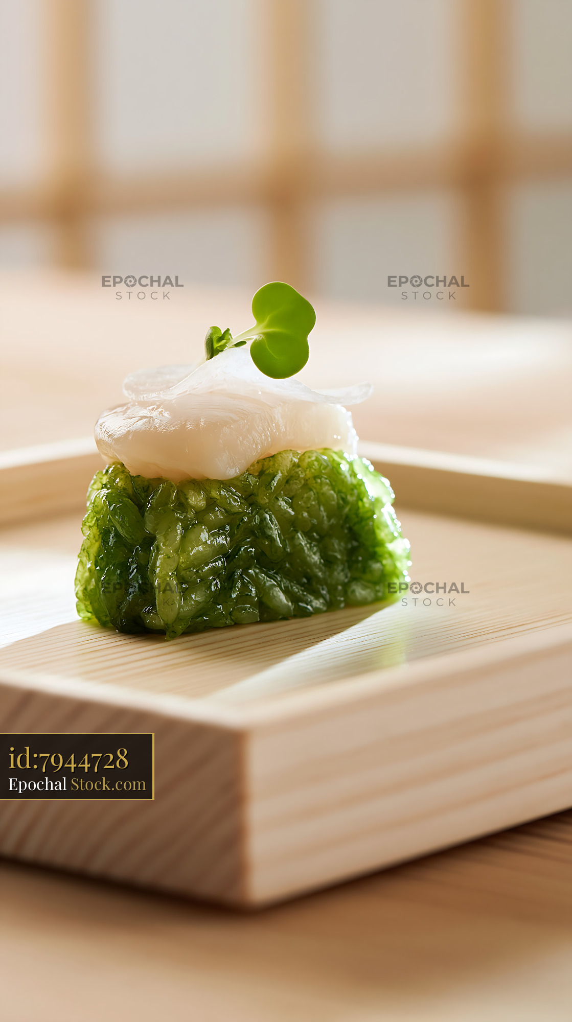 Matcha infused rice sushi topped with fresh scallop on a wooden tray - stock photo