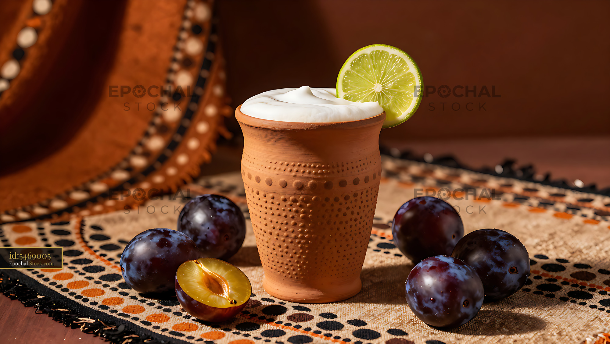 Kakadu Plum Keepsake smoothie in a rustic terracotta cup with lime - stock photo