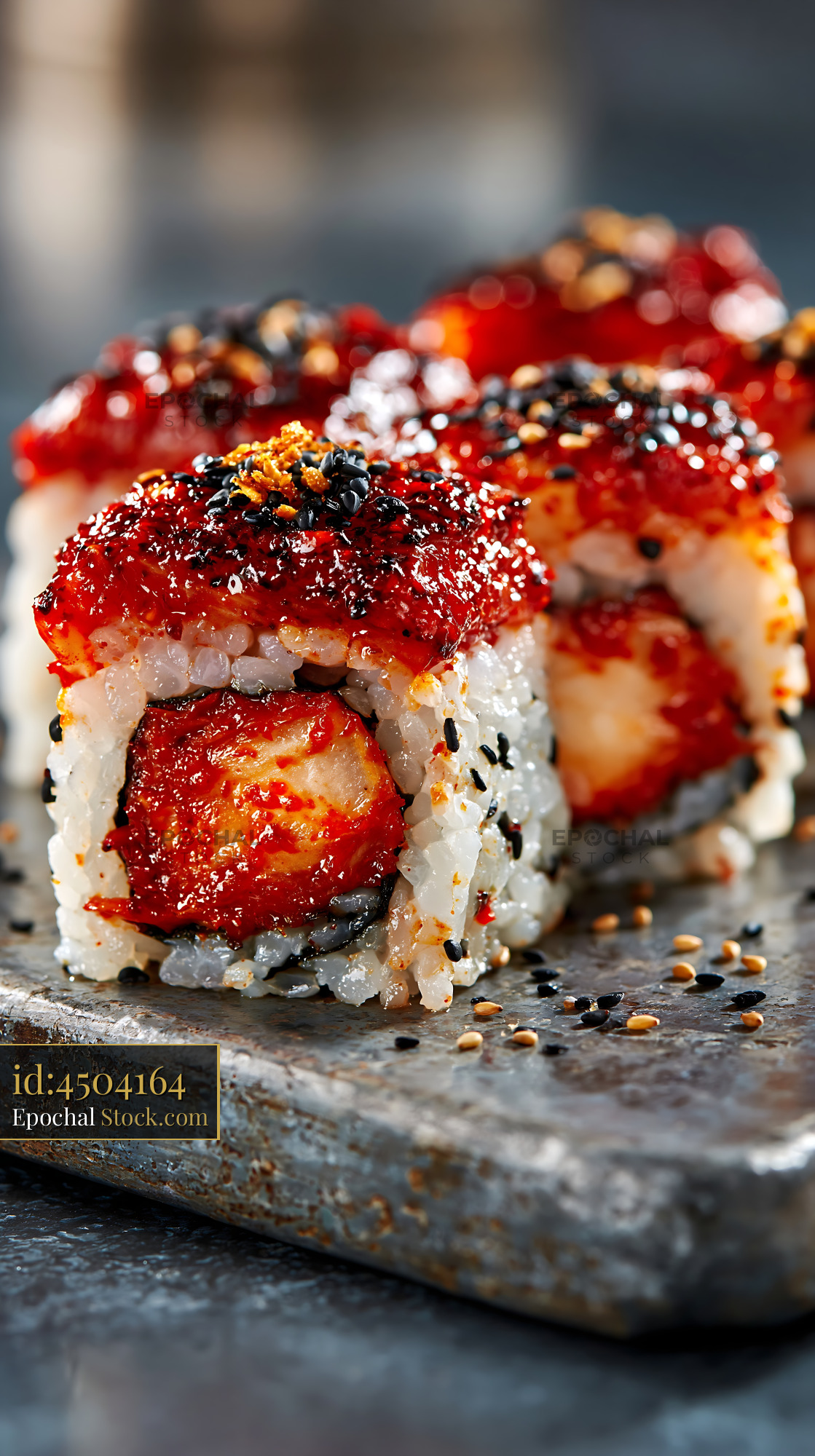 Kimchi fusion maki sushi rolls with spicy glaze and sesame seeds - stock photo