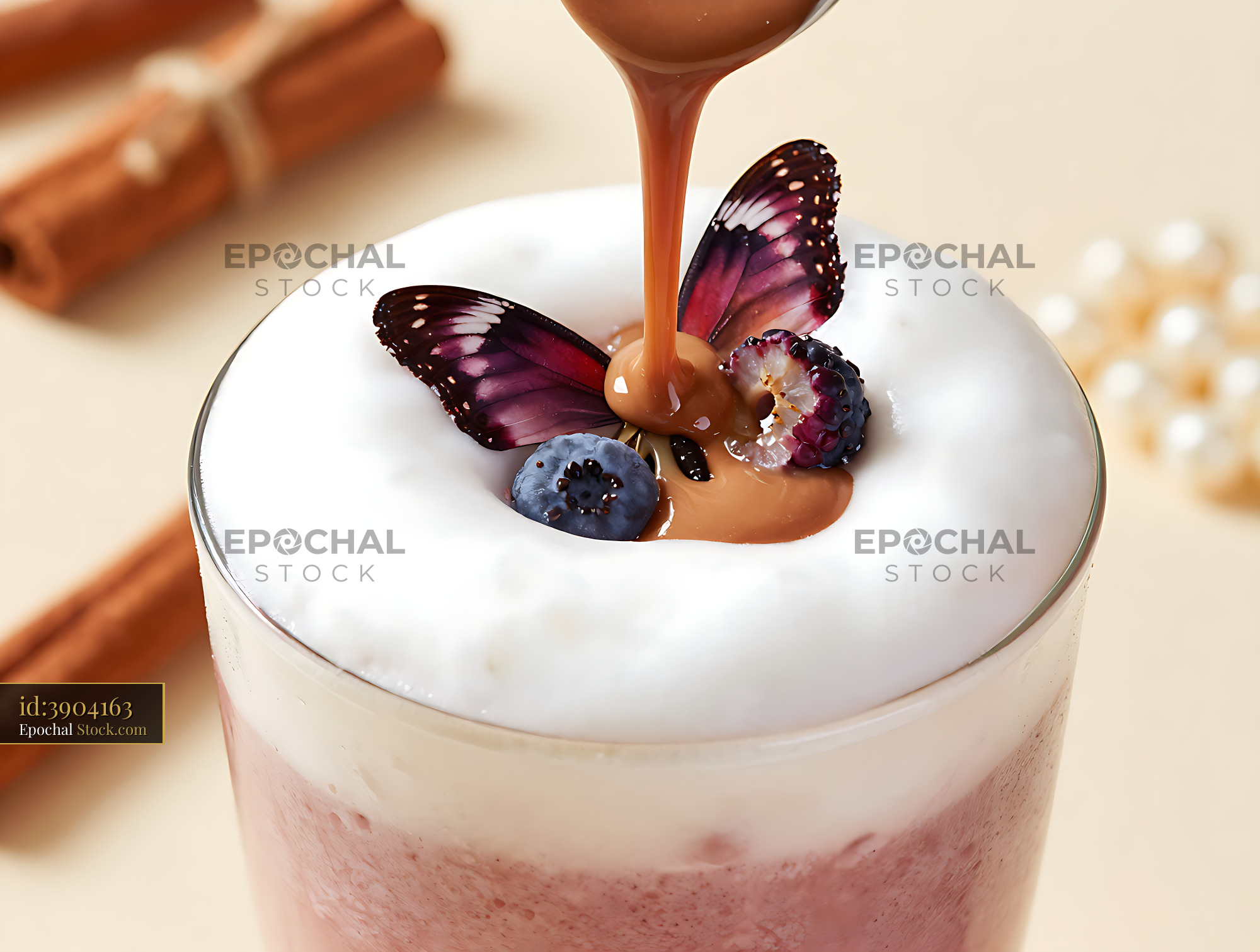 Muntries Mosaic smoothie with butterfly garnish and caramel pour - stock photo
