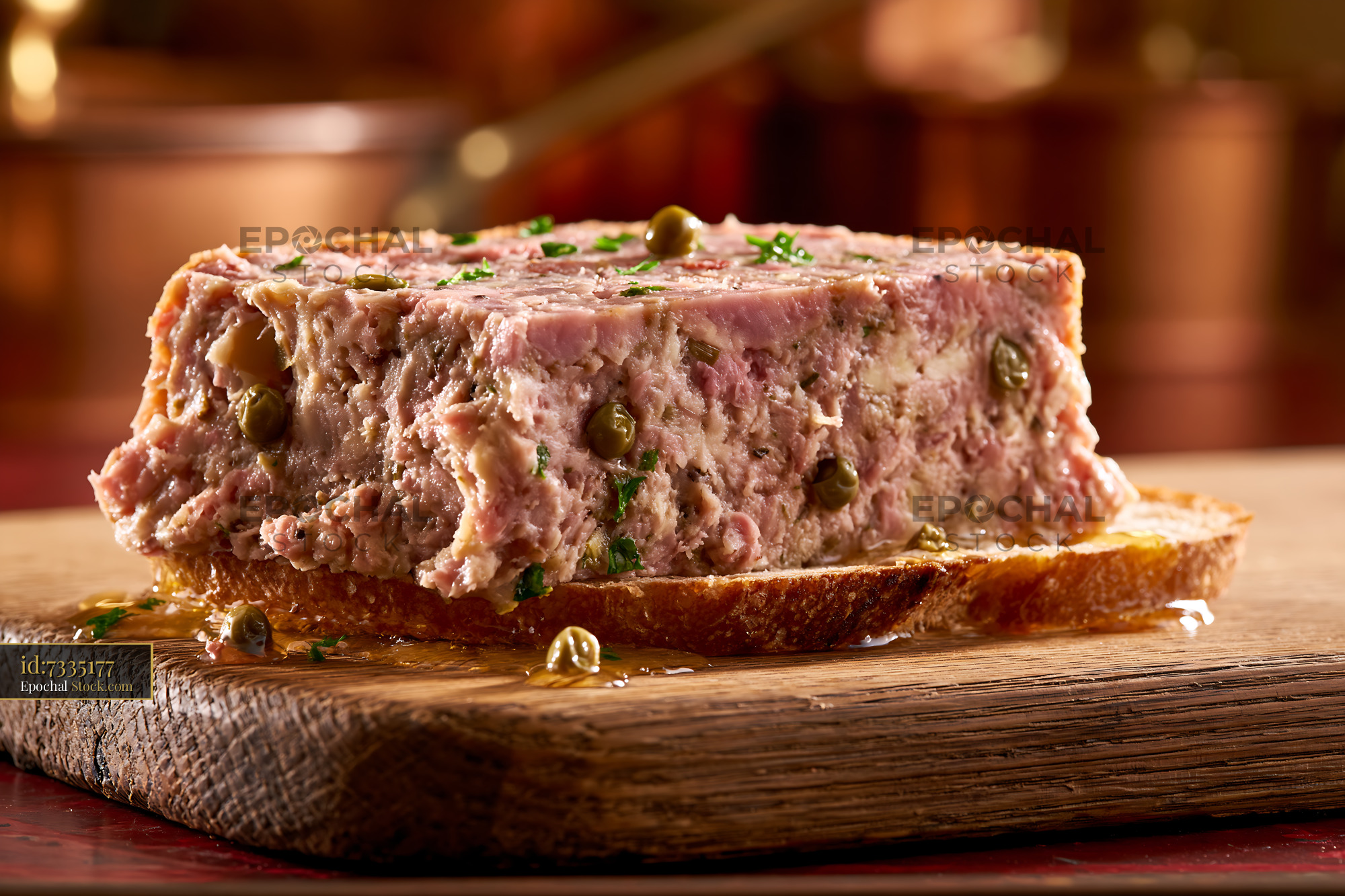 Rustic confit de canard meat terrine with capers on toasted bread - stock photo