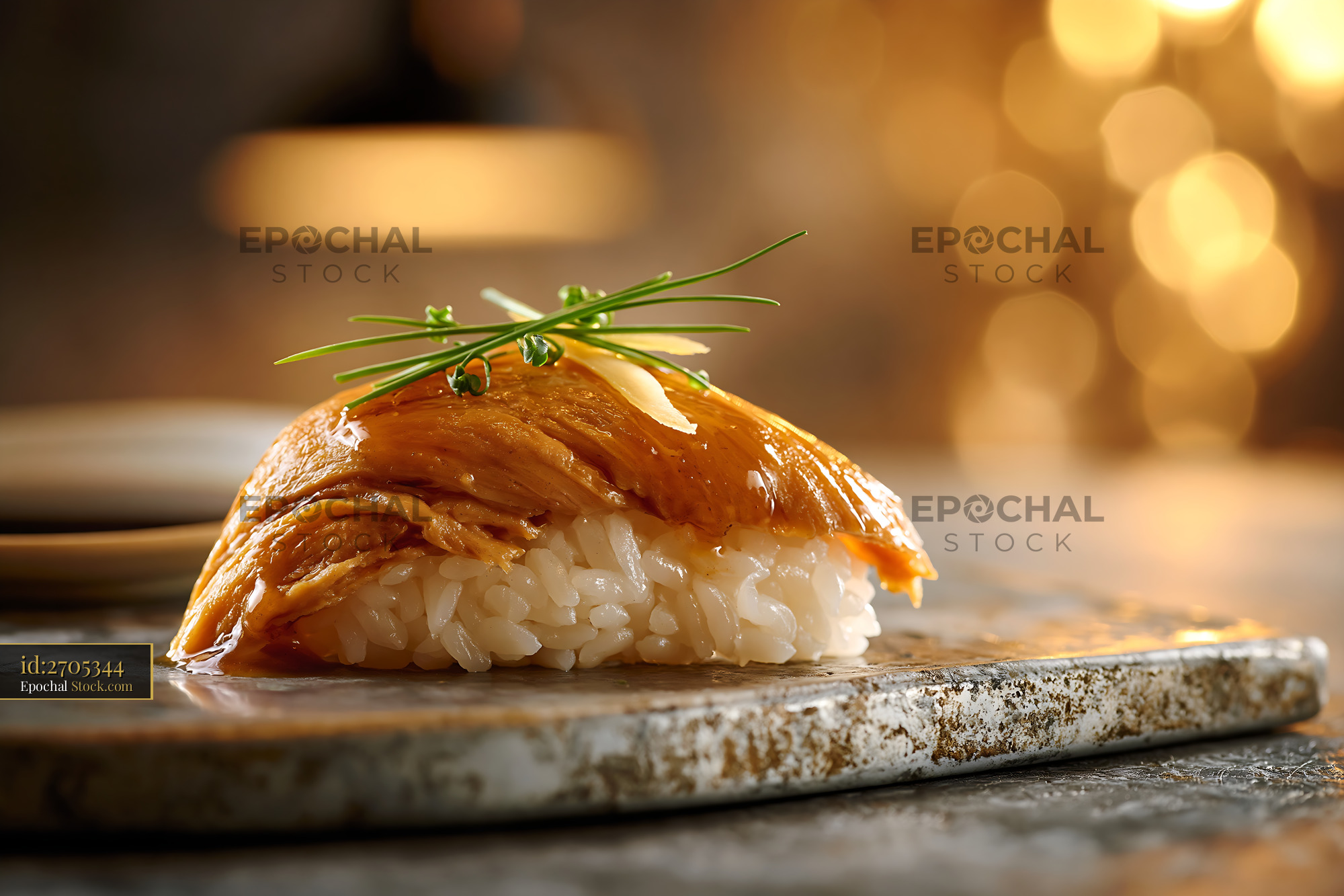 Gourmet jackfruit nigiri sushi with chives on a stone platter - stock photo