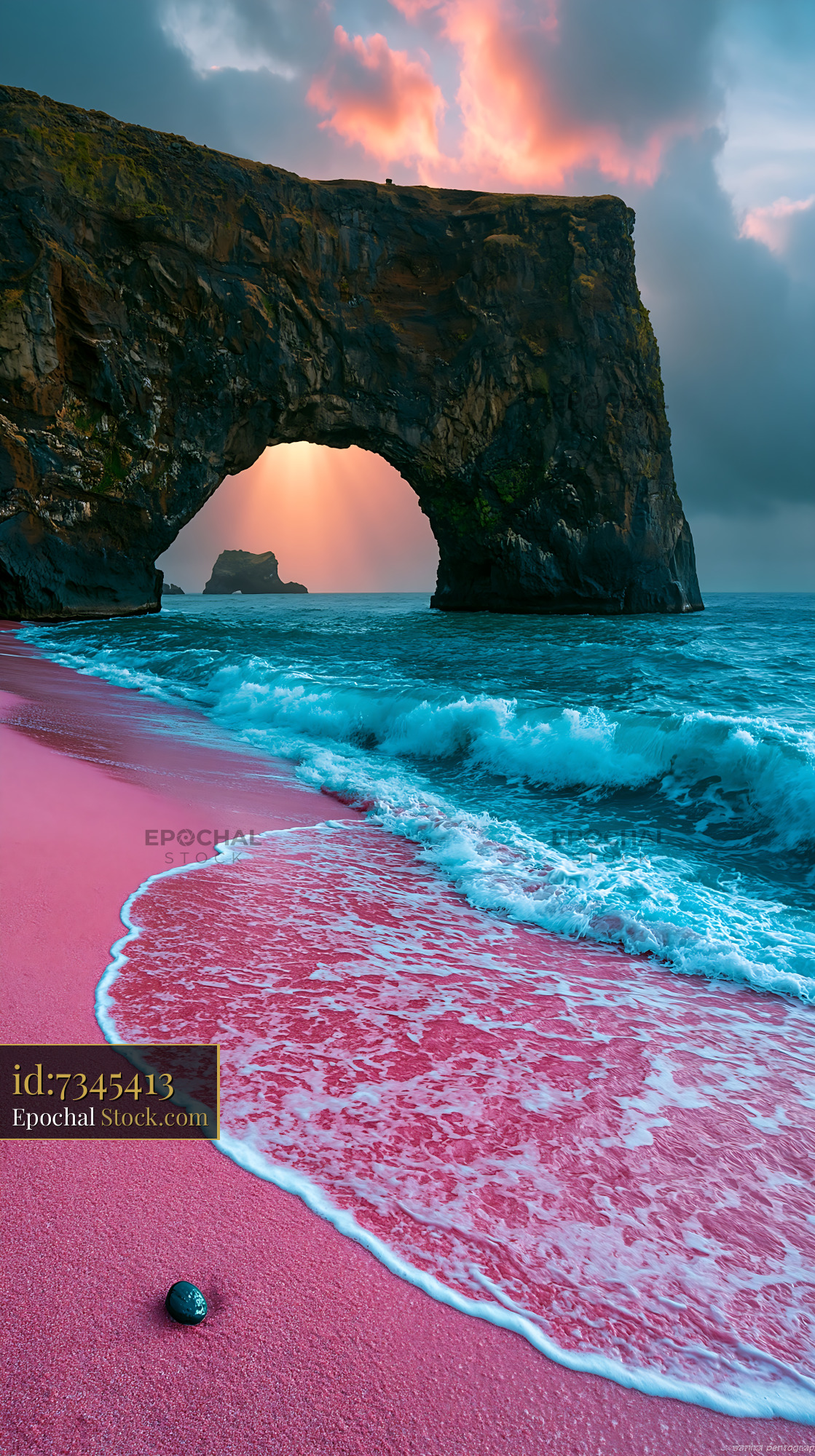 Surreal pink sand beach with a dramatic sea arch at sunset - stock photo