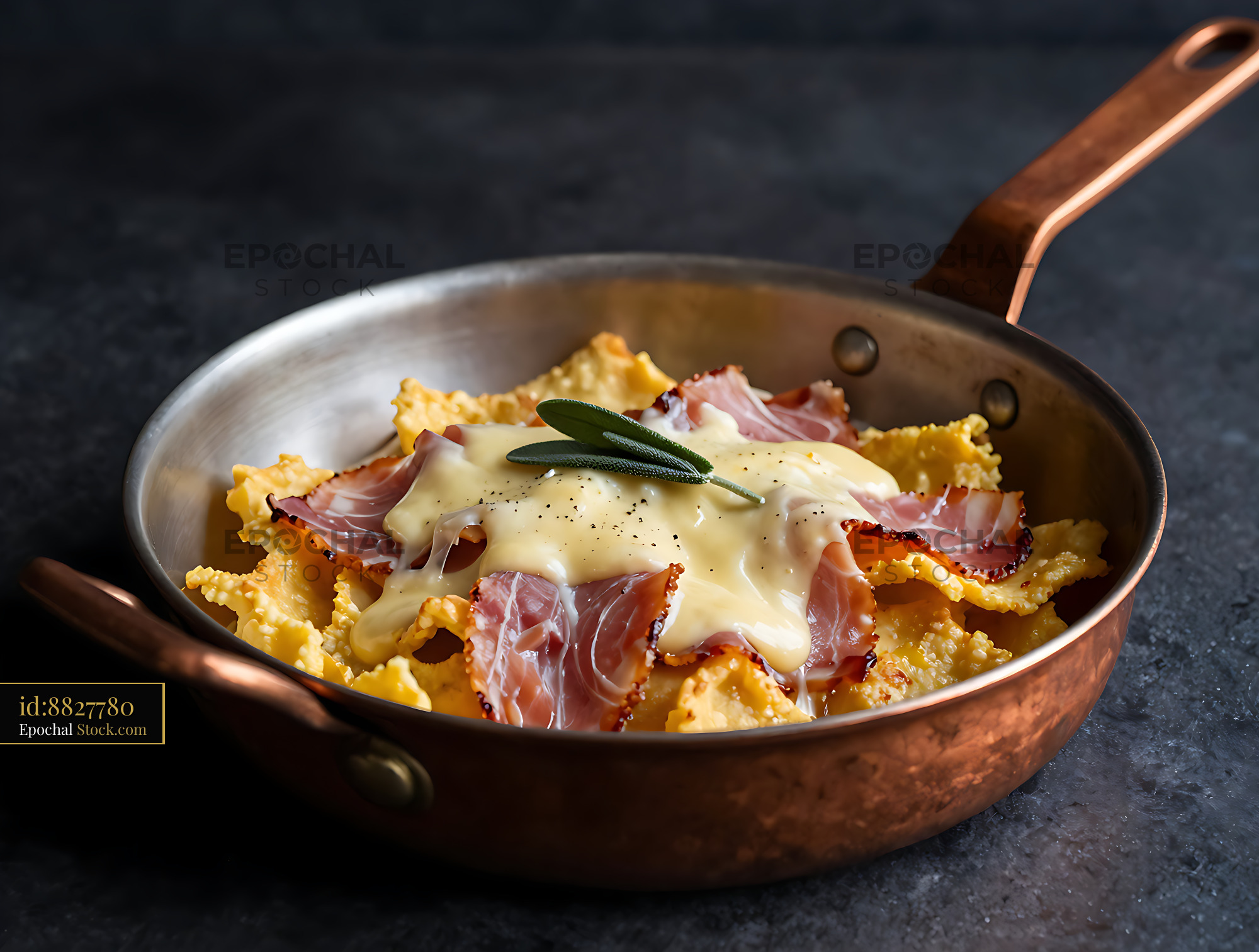 Traditional Kaesknoepfle mit Schinken served in a rustic copper pan - stock photo
