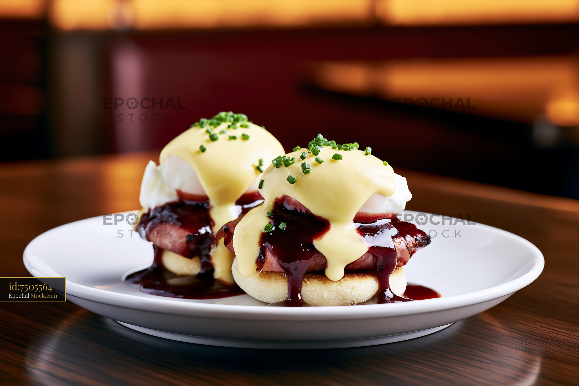 Gourmet eggs hussarde with poached eggs and red wine sauce on a plate - stock photo