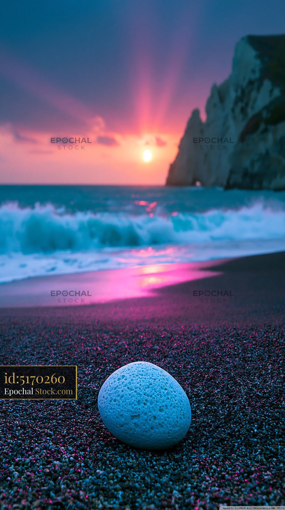 Pumice stone on a volcanic beach with dramatic sunset over cliffs - stock photo